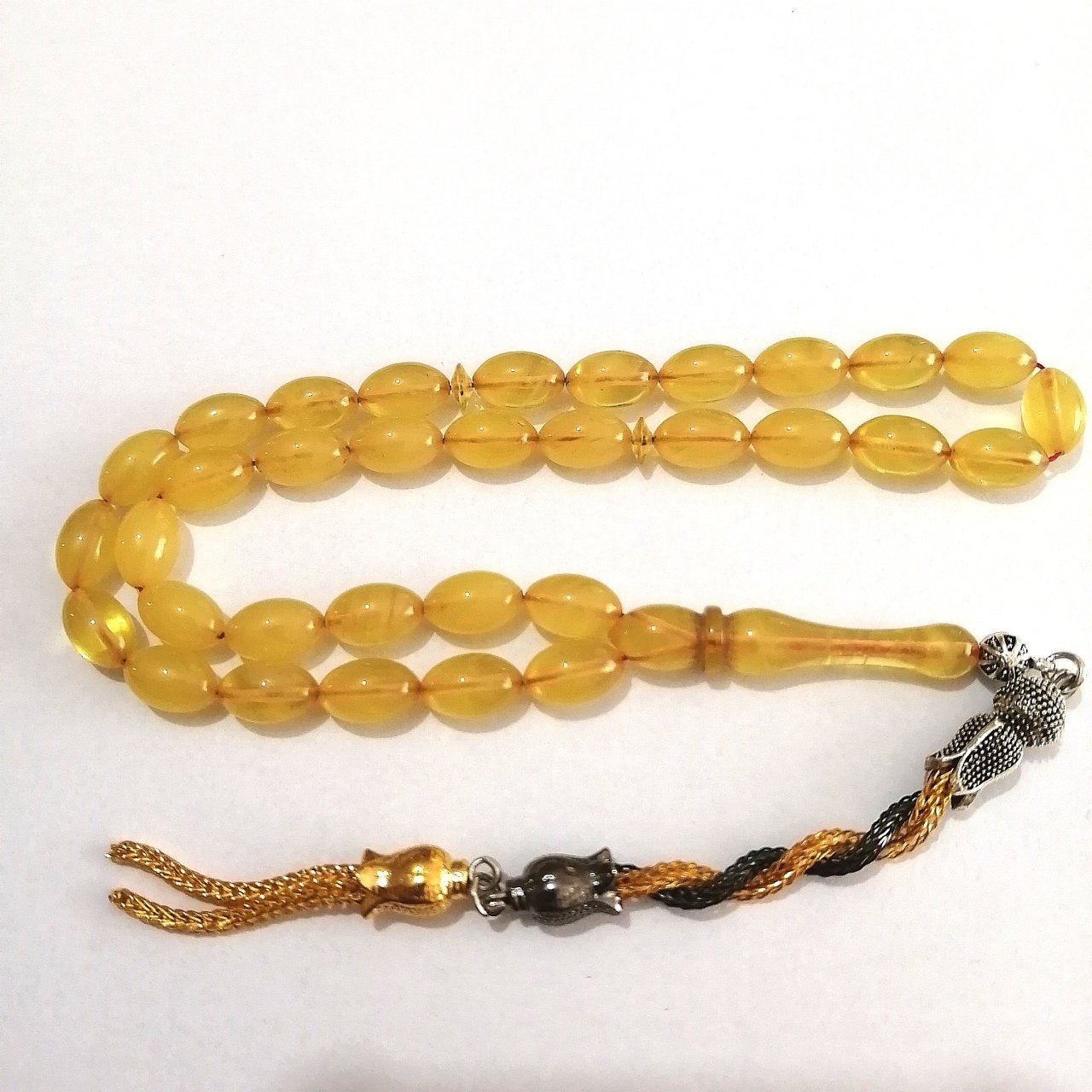 Alpaka Püsküllü Beyzi Kesim Sıkma Kehribar Tesbih