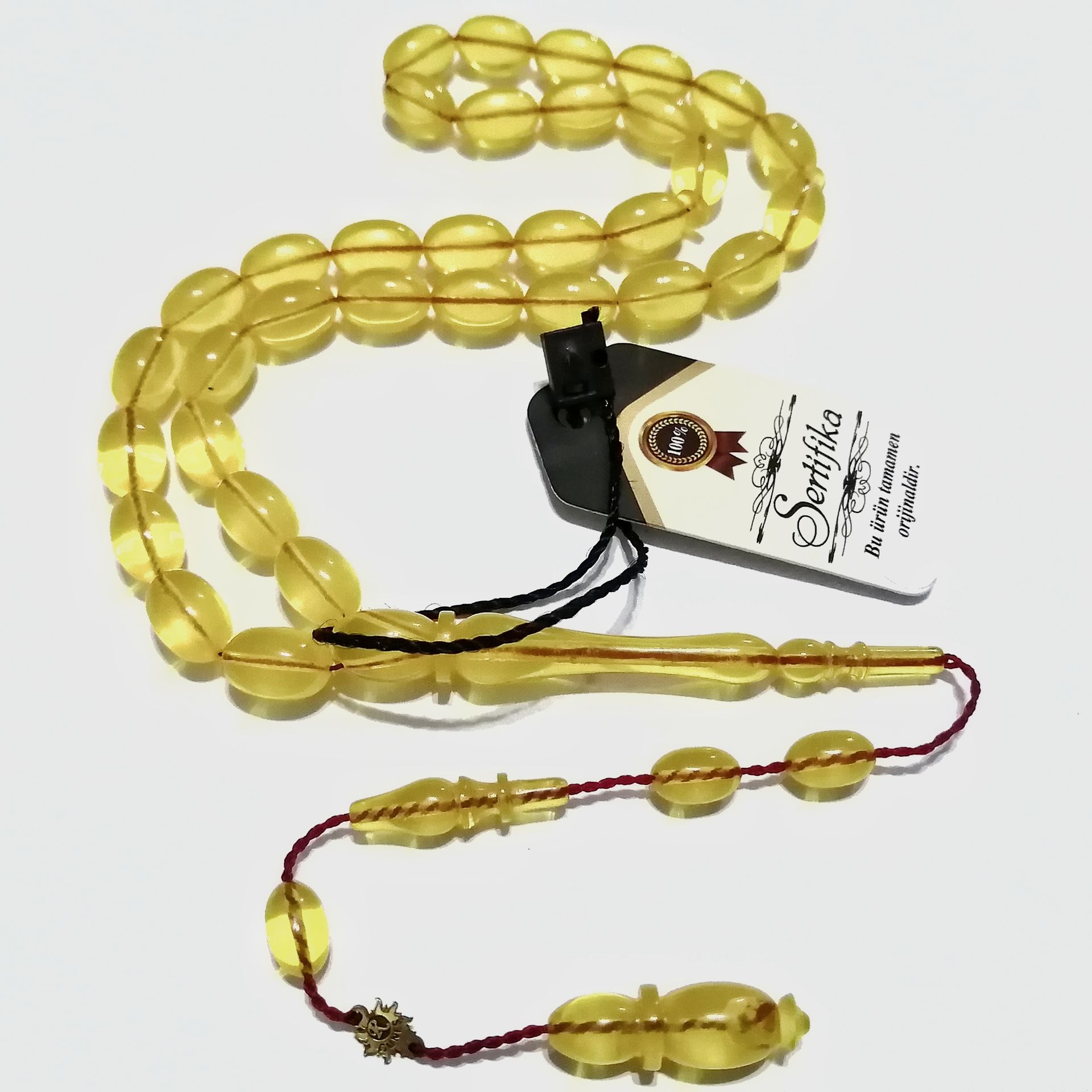 Sistem Püsküllü 06 Delim İmzalı Hatasız Hareli Badem Kesim Ateş Kehribar Tesbih