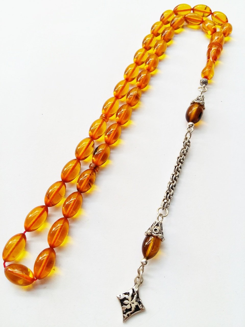 925 Ayar Gümüş Püsküllü Elde Yağ Gibi Çekimi Olan Birinci Sınıf Malzeme Yapımı  İşçilikli, Kolleksiyonluk  ve Günlük Çekime Uygun Sıkma Kehribar Tesbih