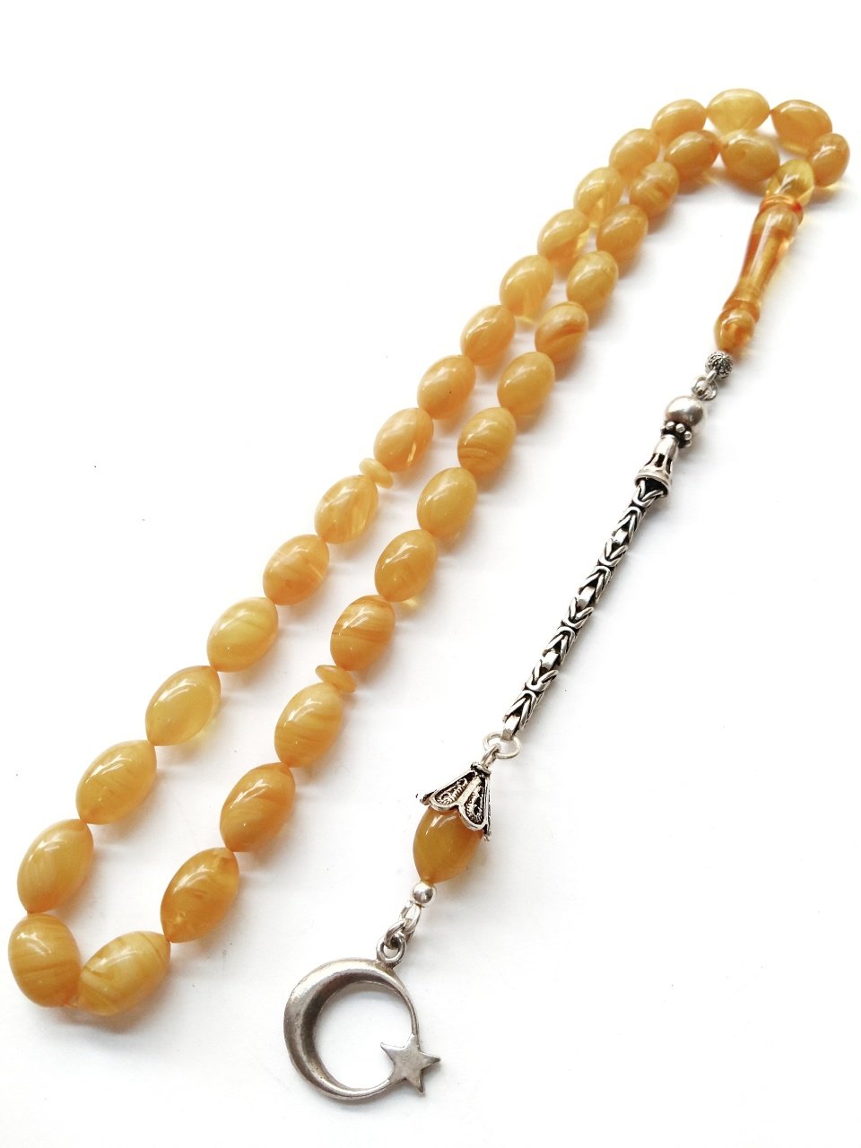 Hareli 925 Ayar Gümüş Püsküllü Elde Yağ Gibi Çekimi Olan Birinci Sınıf Malzeme Yapımı İşçilikli, Kolleksiyonluk ve Günlük Çekime Uygun Sıkma Kehribar Tesbih