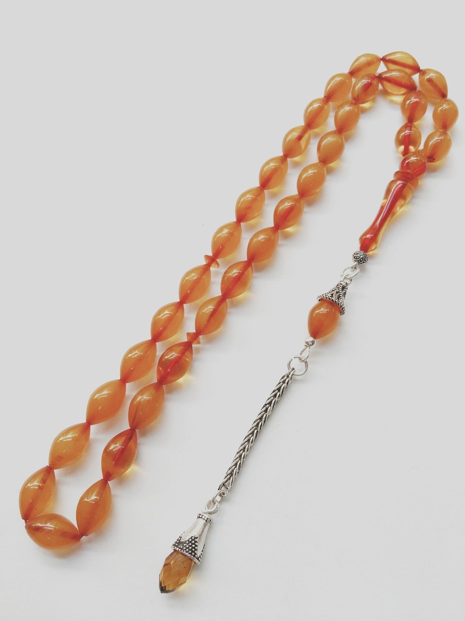 925 Ayar Gümüş Püsküllü Elde Yağ Gibi Çekimi Olan Birinci Sınıf Malzeme Yapımı  İşçilikli, Kolleksiyonluk  ve Günlük Çekime Uygun Sıkma Kehribar Tesbih