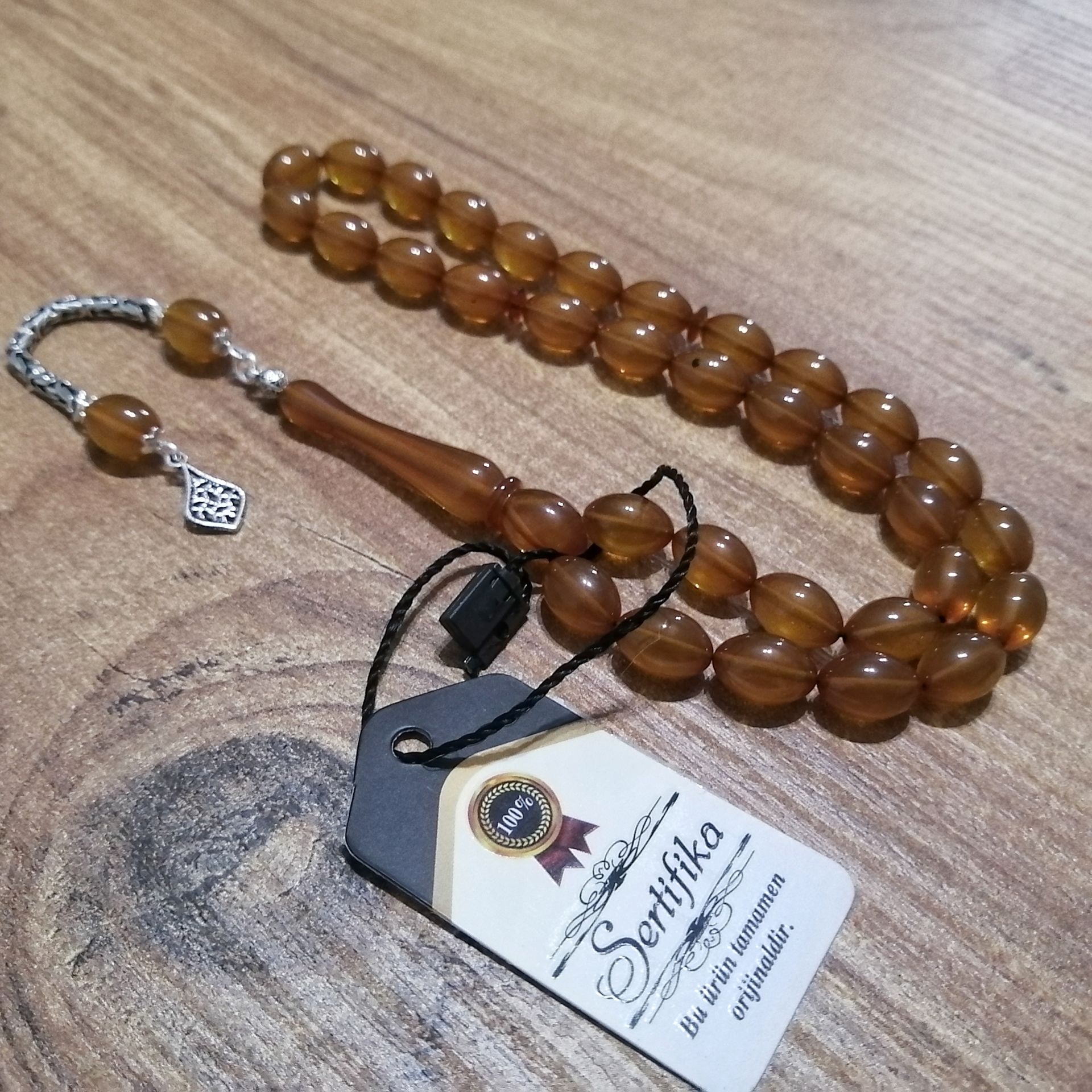 925 Ayar Gümüş Püsküllü Beyzi Kesim Sıkma Kehribar Tesbih