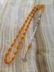 925 Ayar Gümüş Püsküllü Hareli Can Alıcı Rengiyle Elinizden Düşürmeyeceğiniz Sıkma Kehribar Tesbih