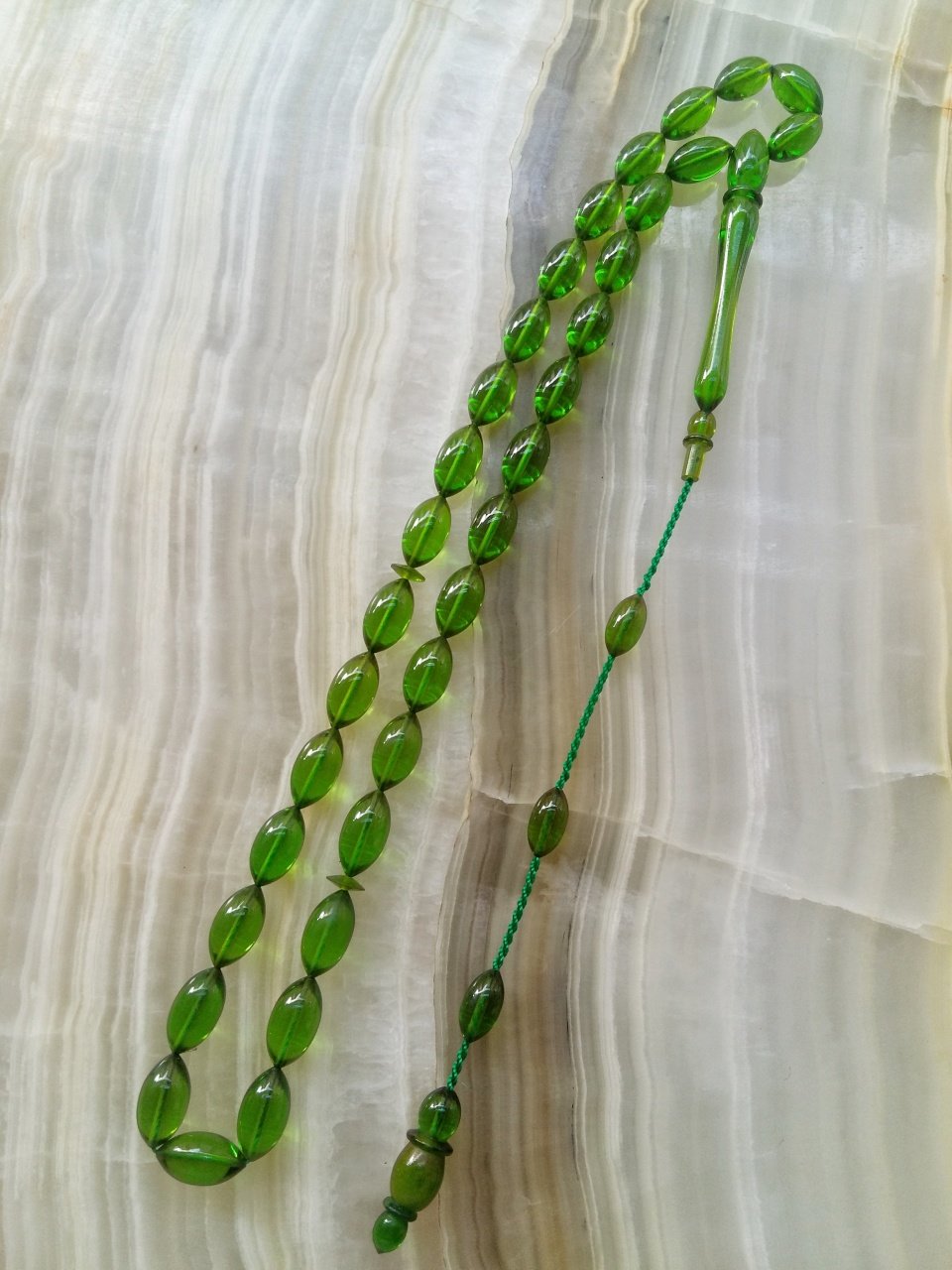 İbrahim Uysal Atölye Yapımı Sistemli Ateş Kehribar Tesbih.Ürün Piyasanın en iyi Hammaddesinden Yapılmış Olup Canlı Rengiyle,Yumuşak Dokusu ve Kusursuz İşçiligiyle Tesbih Severlerin Beğenisine Sunulmuştur