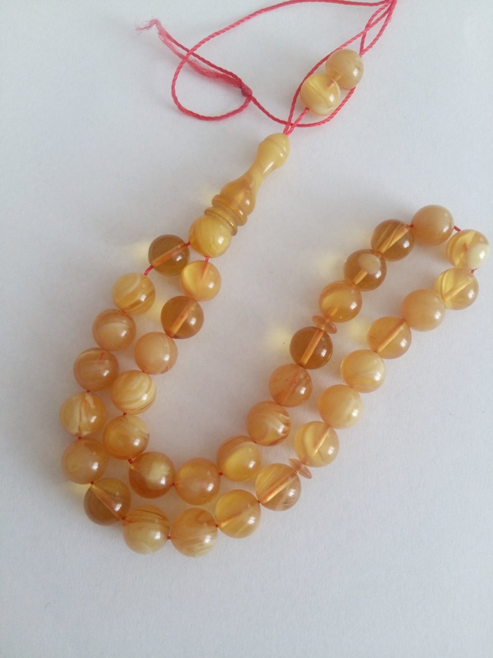 Minik Boy Küre Kesim Sıkma Kehribar Tesbih