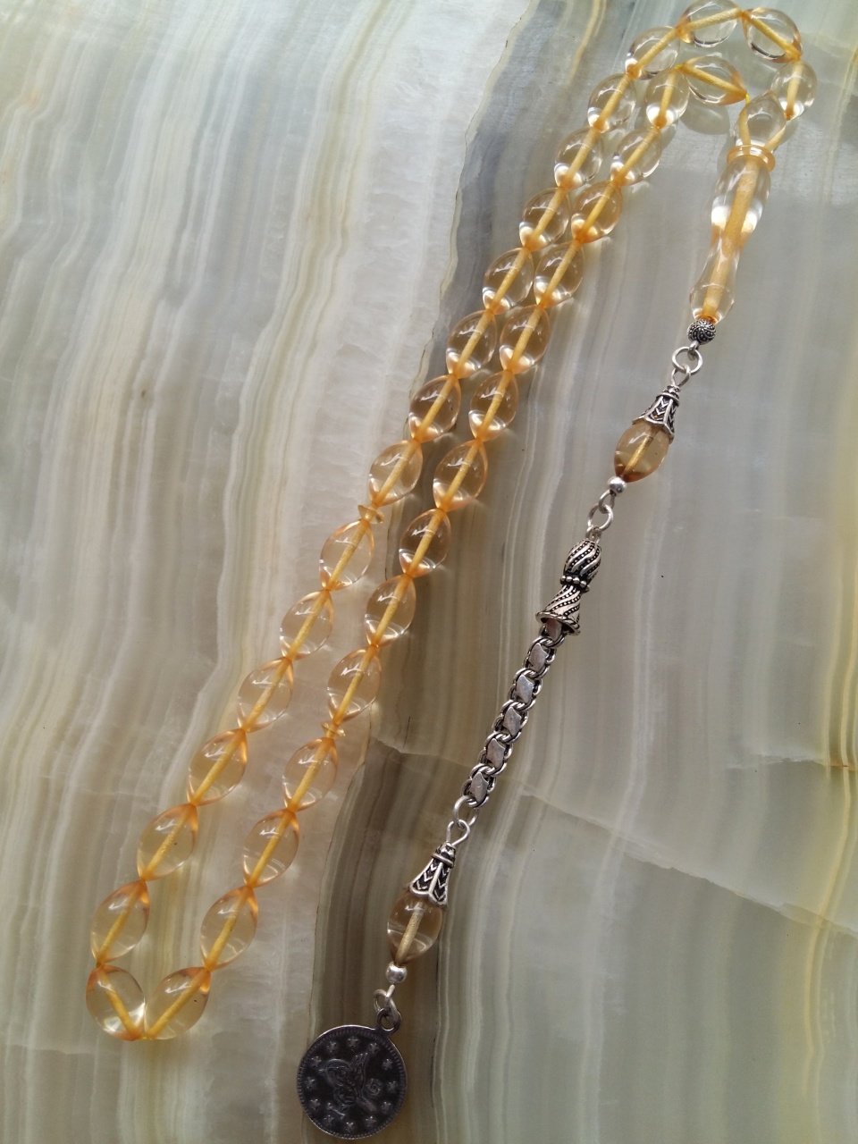 925 Ayar Gümüş Püsküllü Elde Yağ Gibi Çekimi Olan Birinci Sınıf Malzeme Yapımı  İşçilikli, Kolleksiyonluk  ve Günlük Çekime Uygun Ateş Kehribar Tesbih