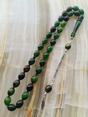 Çektikçe Parlayacak Hareli 925 Ayar Gümüş Püsküllü Sıkma Kehribar Tesbih. Tesbih Malzemesi Piyasanın en iyi Hammadesinden Yapılmış Olup Canlılık Renk Yumuşak Dokusu ve Kusursuz Isciligiyle Tesbih Severlerin Beğenisine Sunulmuştur.