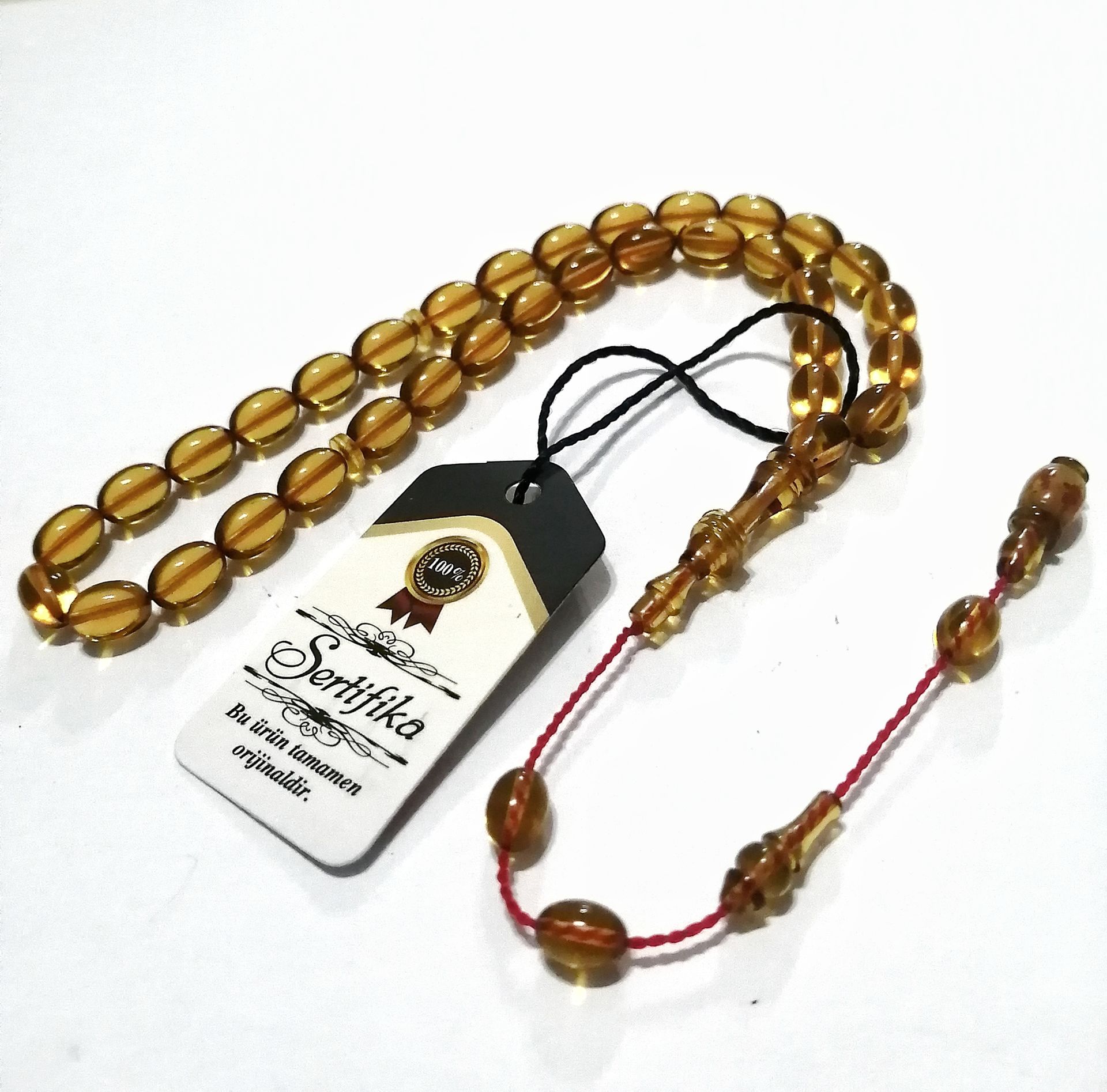 Sistem Püsküllü İmamesi Halkalı Beyzi Kesim Ateş Kehribar Tesbih