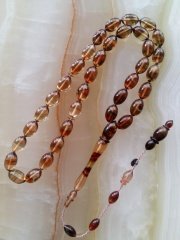 Sistem Püsküllü Özel İşçilikli Sıkma Kehribar Tesbihimiz İznikli İbrahim Uysal Kalitesiyle Tesbih Severlerin Beğenisine Sunulmuştur