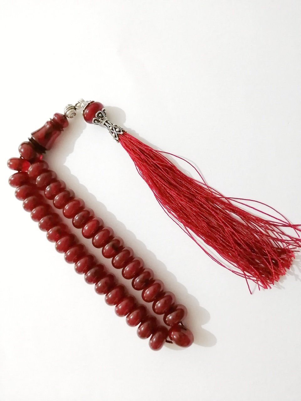 İp Püsküllü Basık Kesim Sıkma Kehribar Tesbih