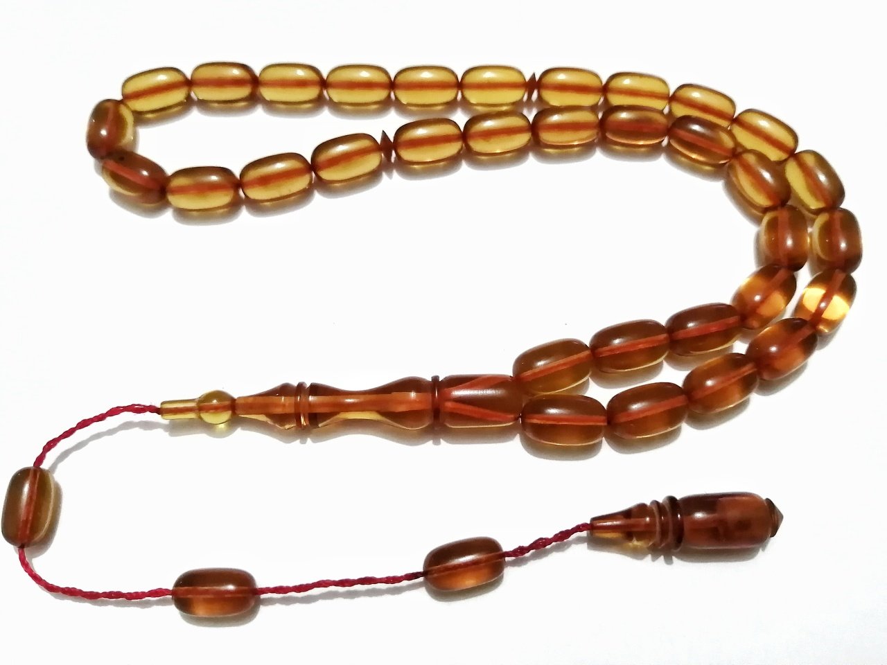 Sistem Püsküllü Özel İşçilikli Kapsül Kesim Ateş Kehribar Tesbih