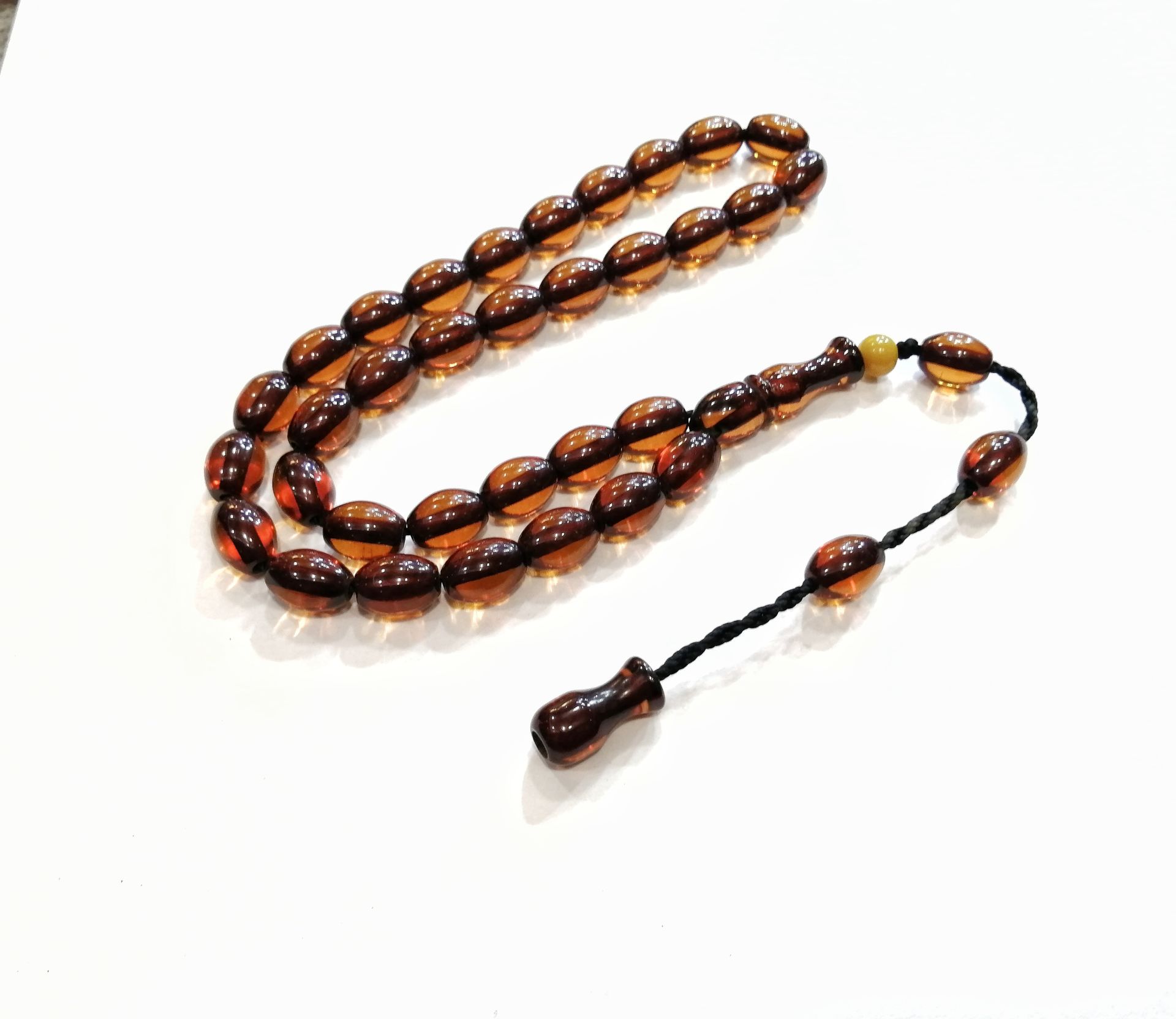 Sistem Püsküllü Beyzi Kesim Ateş Kehribar Tesbih