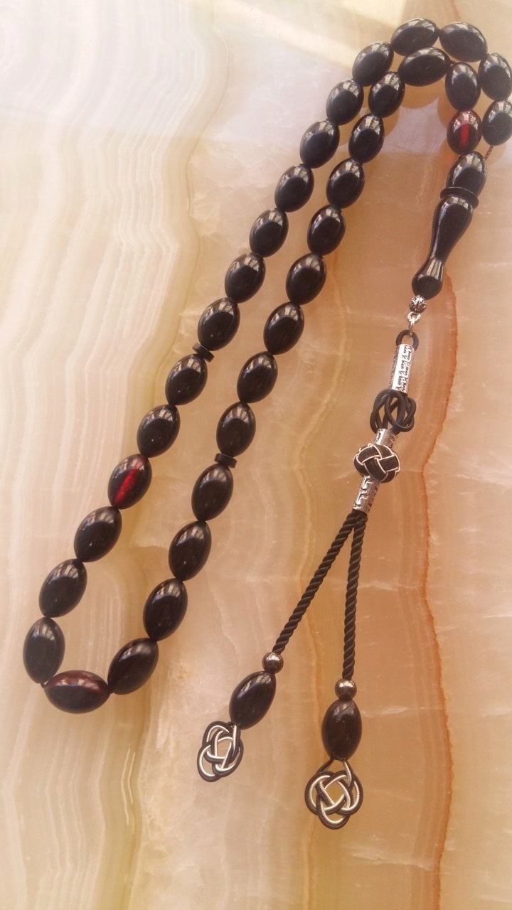 Kazaz Püsküllü Elde Yağ Gibi Çekimi Olan Birinci Kalite Malzemeden Yapılmış Beyzi Kesim Sıkma Kehribar Tesbih