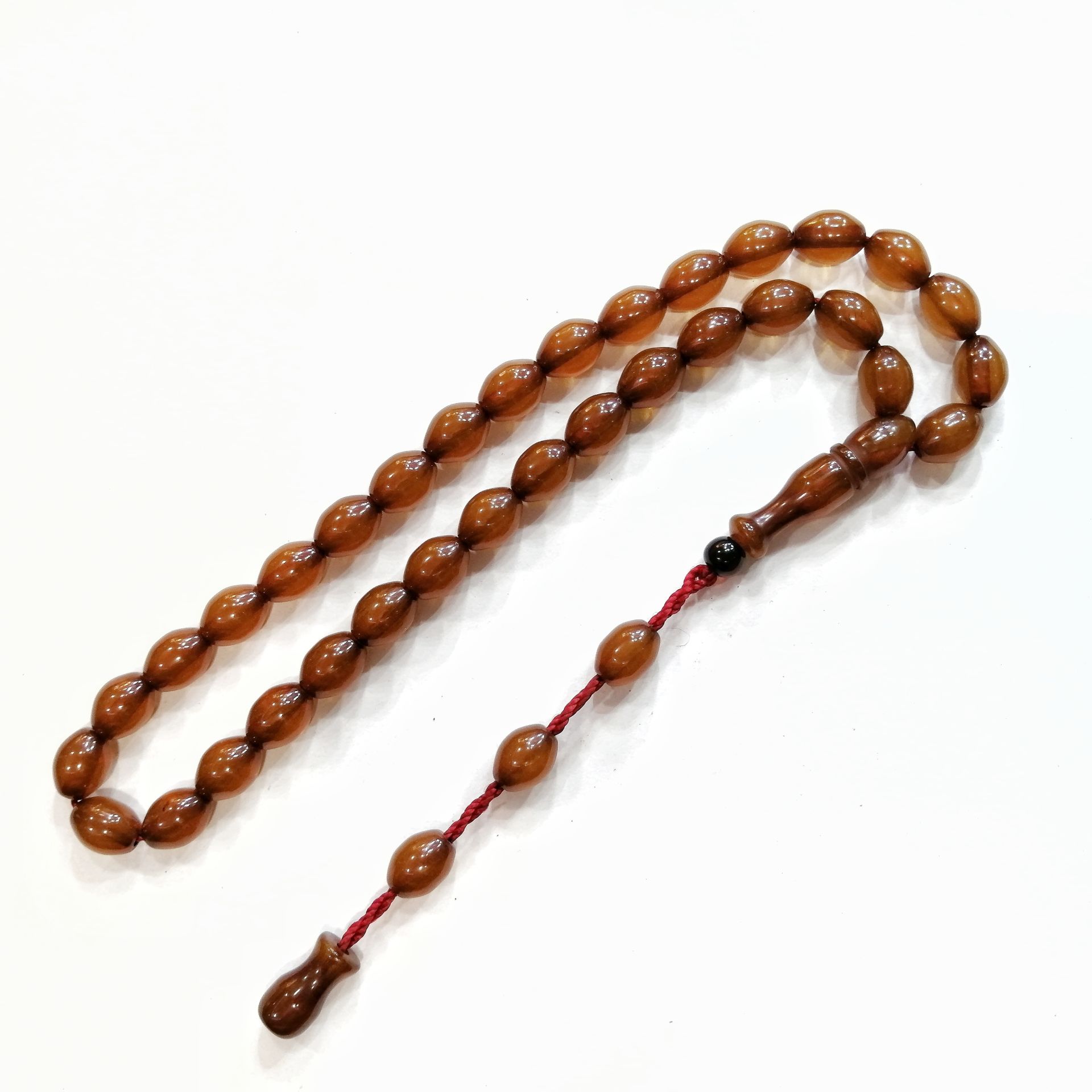 Sistem Püsküllü Beyzi Kesim Sıkma Kehribar Tesbih