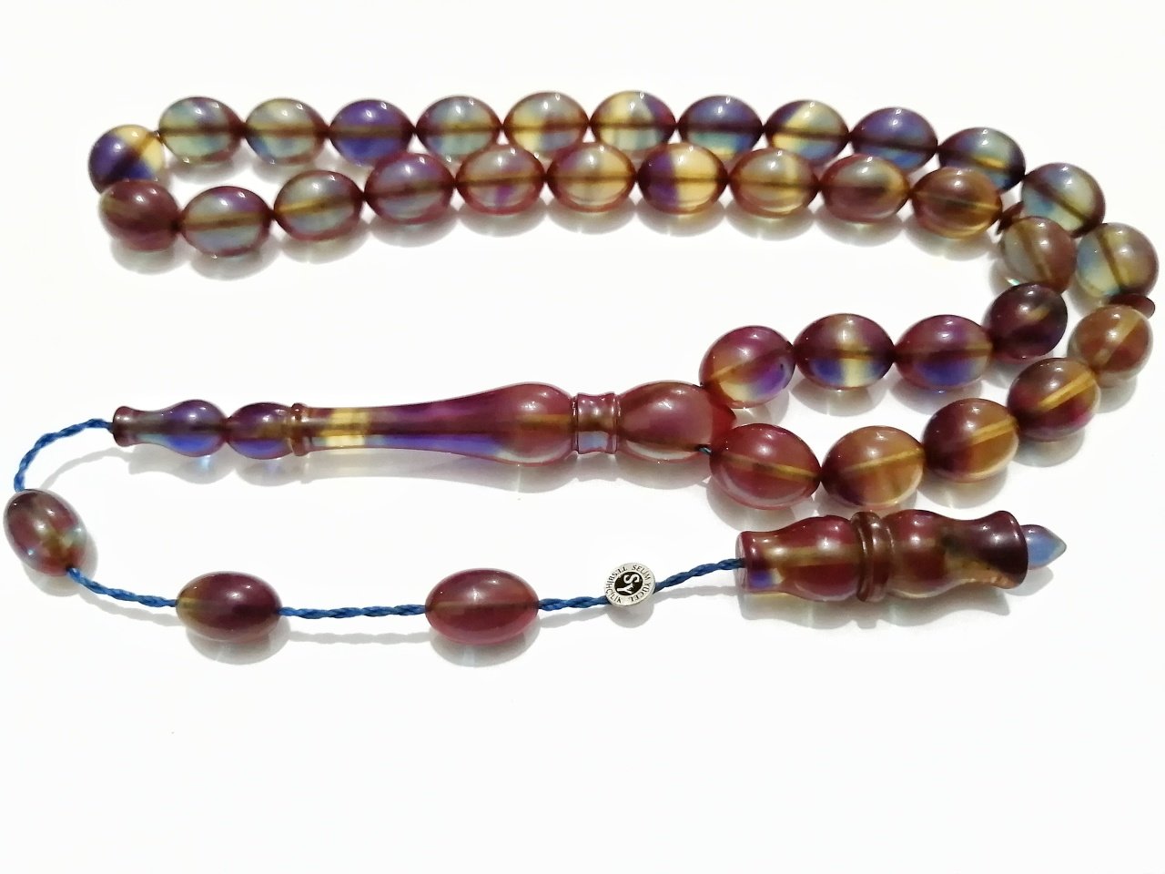 Sistem Püsküllü Selim Yücel Gümüş İmzalı Beyzi Kesim Sıkma Kehribar Tesbih