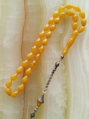 Damla Kesim Özel İşçilikli Atölye Yapımı 925 Ayar Gümüş Püsküllü Sıkma Kehribar Tesbih.