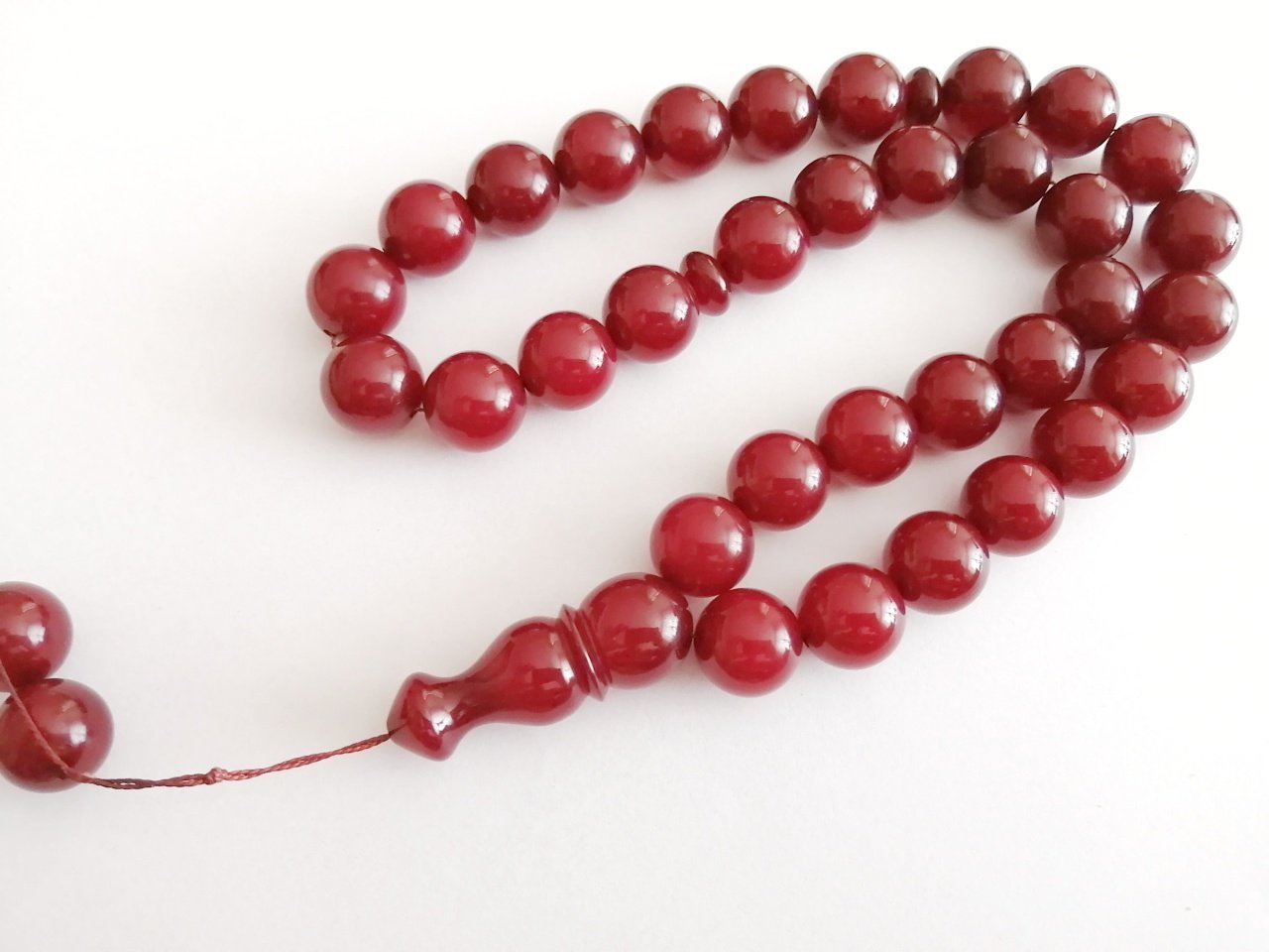 Büyük Boy Küre Kesim Sıkma Kehribar Tesbih