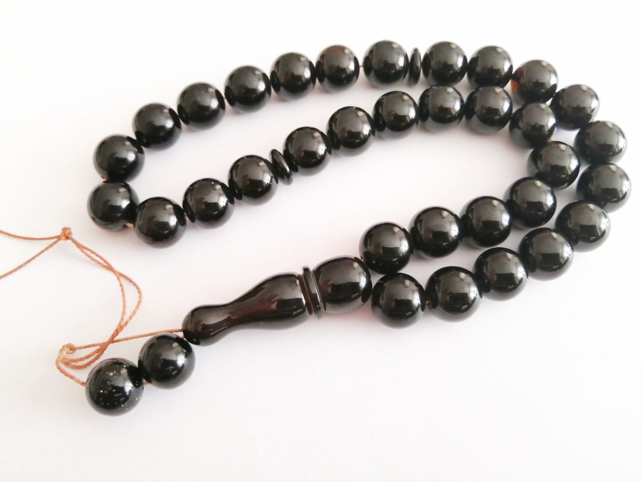 Büyük Boy Küre Kesim Sıkma Kehribar Tesbih