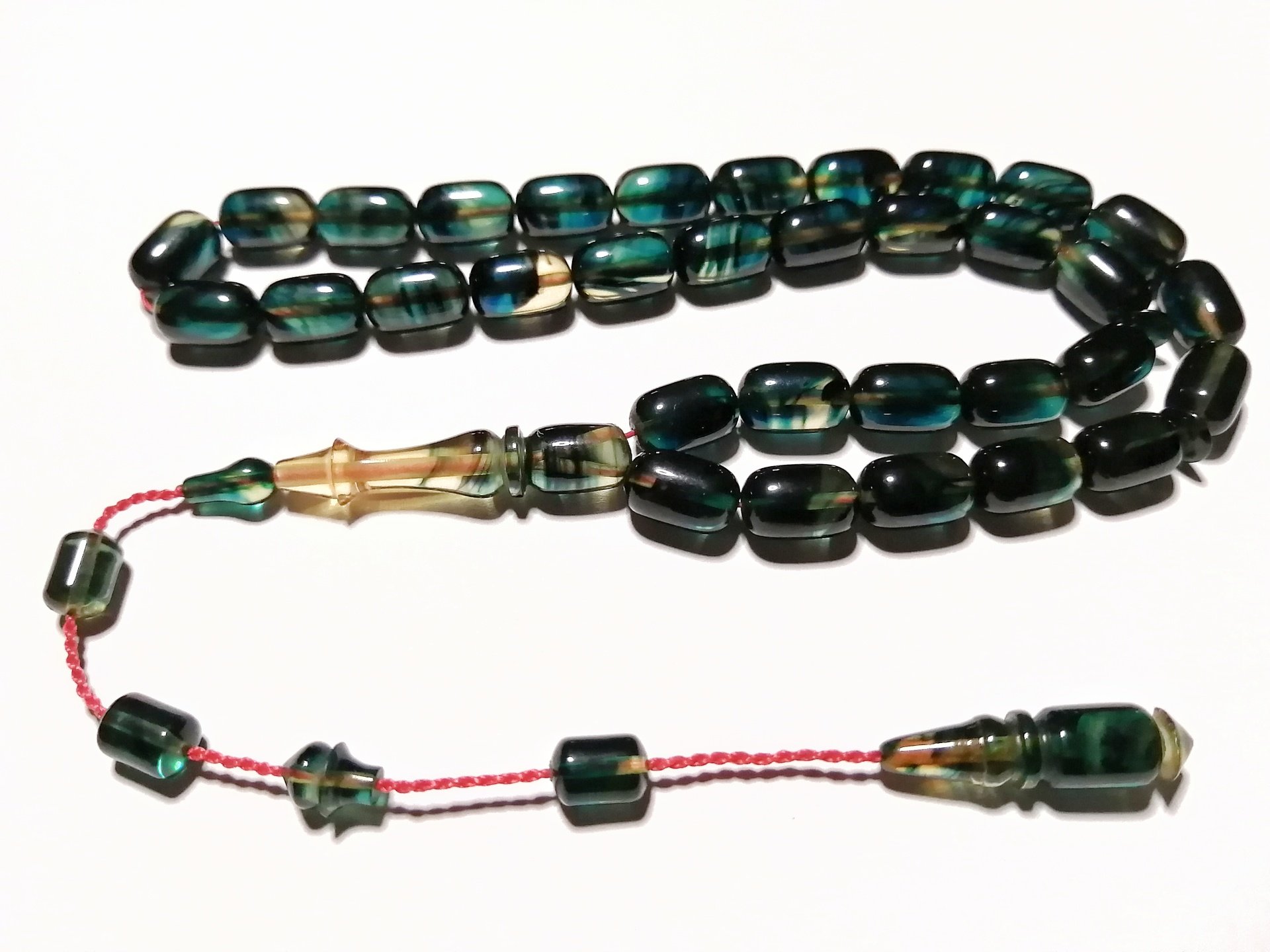 Sistem Püsküllü Özel İşçilikli Kapsül Kesim Hareli Sıkma Kehribar Tesbih