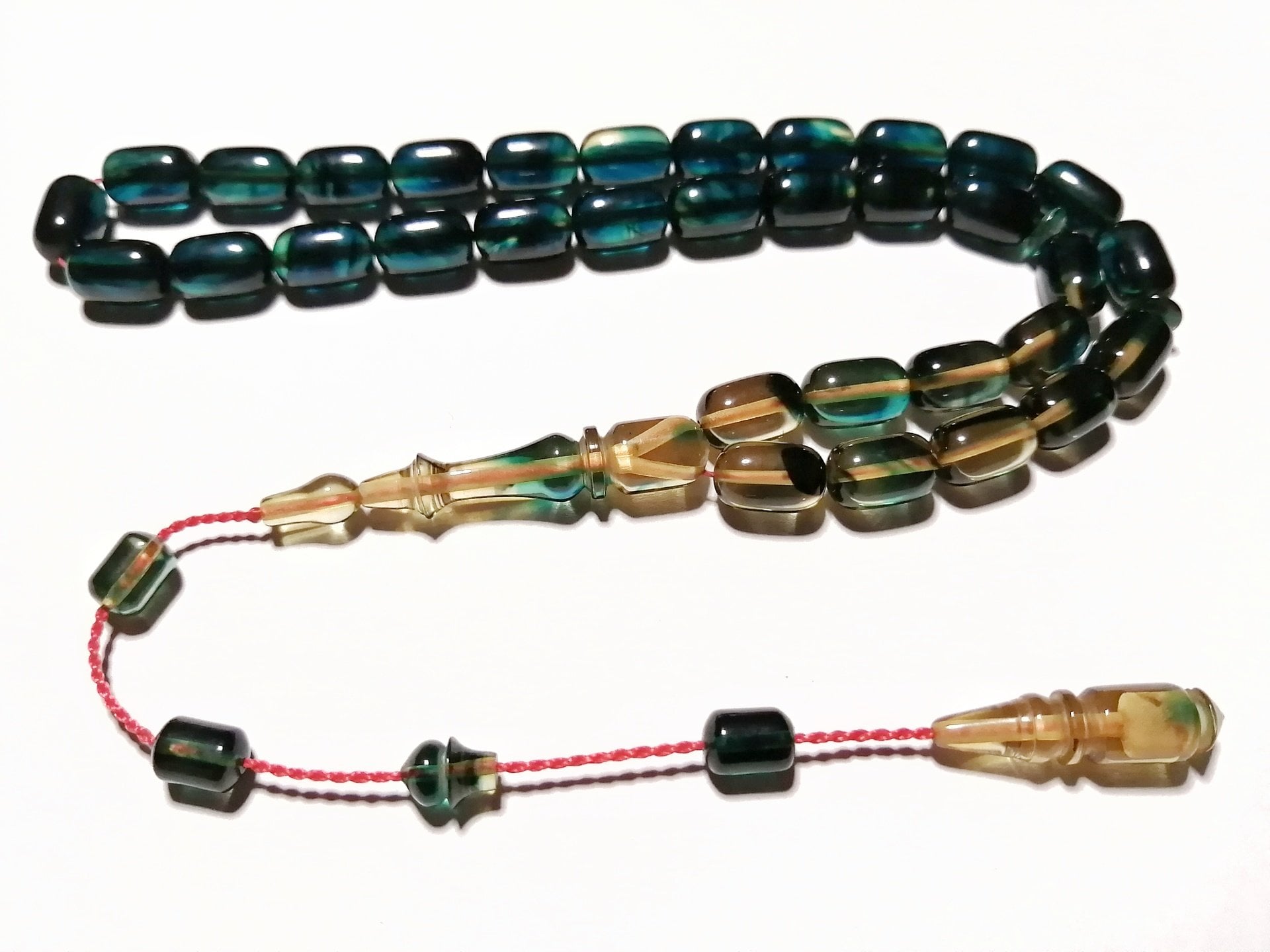 Sistem Püsküllü Özel İşçilikli Kapsül Kesim Hareli Sıkma Kehribar Tesbih