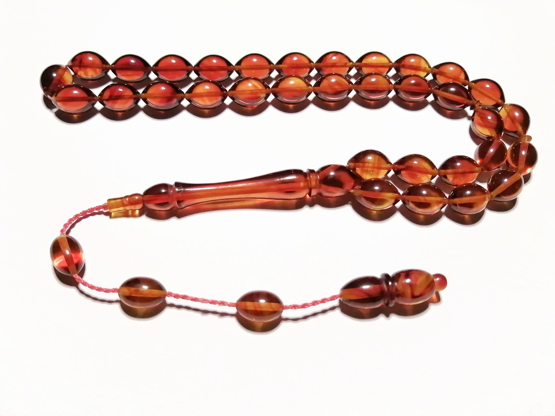 Sistem Püsküllü Beyzi Kesim Sıkma Kehribar Tesbih