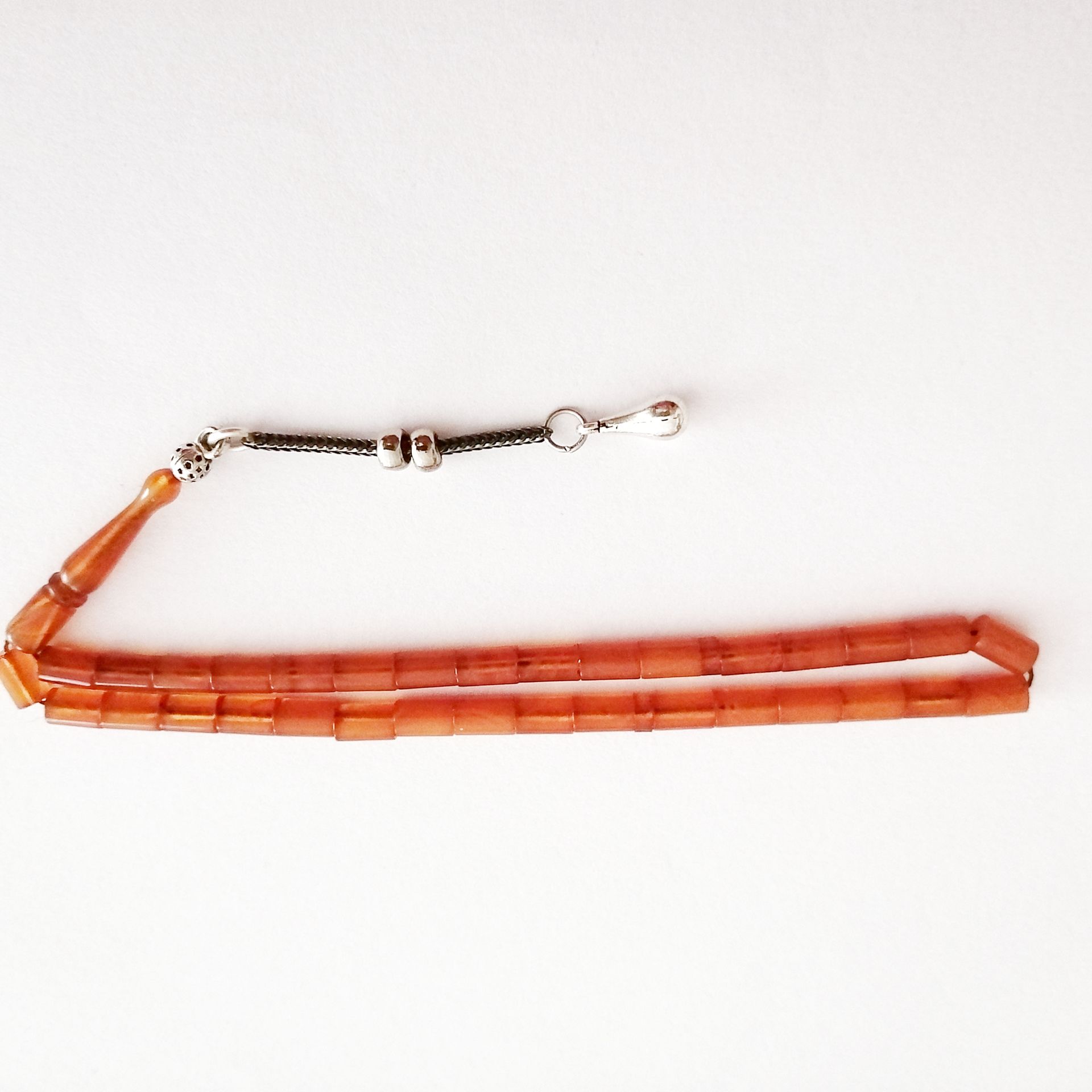 Alpaka Püsküllü Kesme Model Hareli Sıkma Kehribar Tesbih