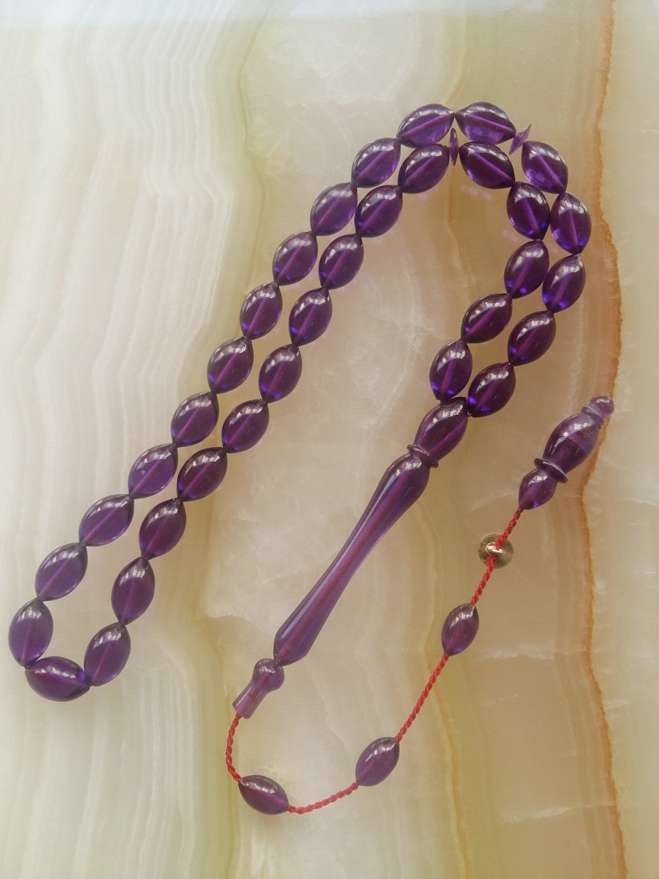 Sistemli Özel İşçilikli Kolleksiyonluk Piyasanın En Kaliteli Hammadesinden Yapılmış Beyzi Kesim Ateş Kehribar Tesbih