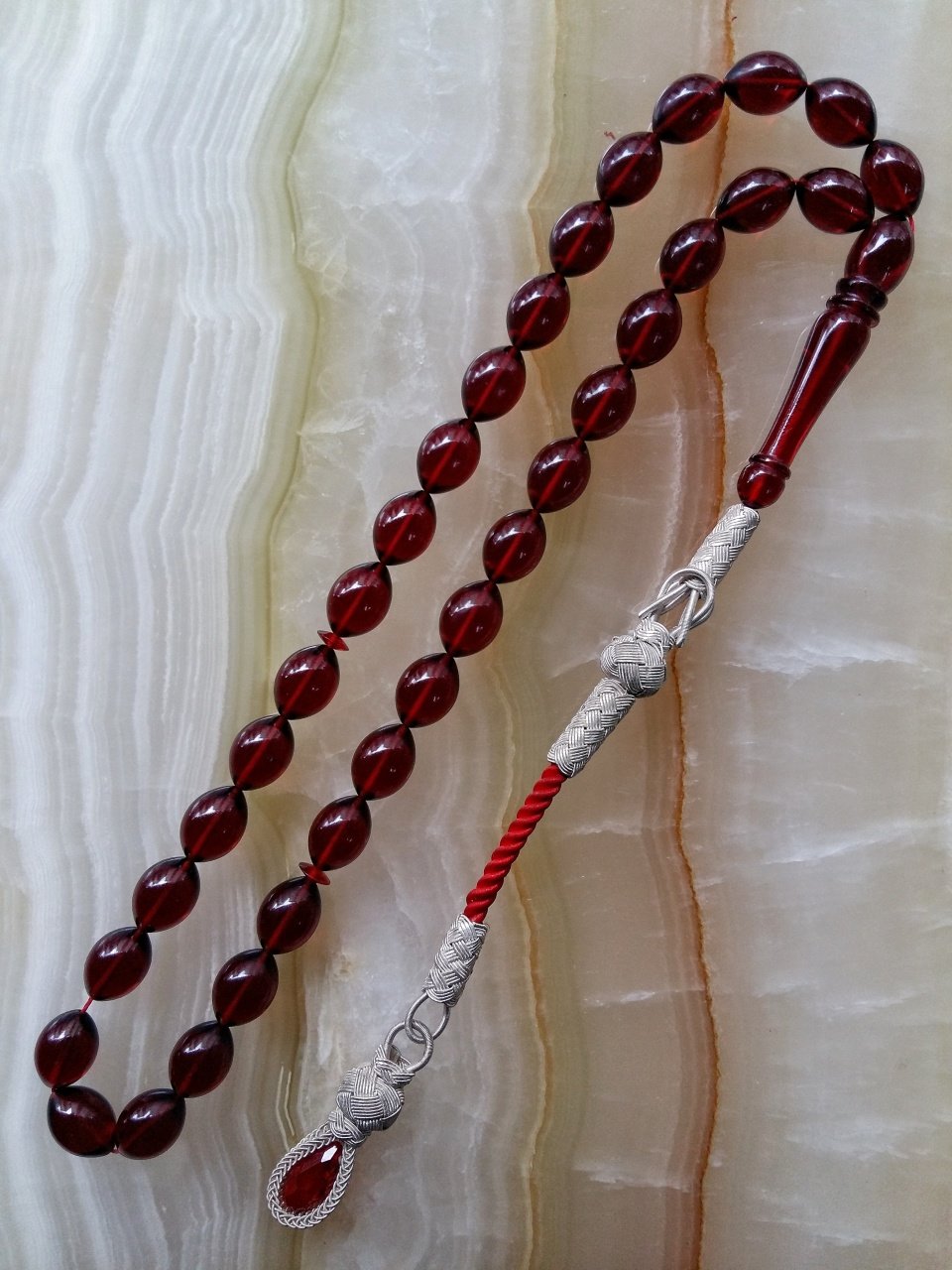 Kazaz Püsküllü Elde Yağ Gibi Çekimi Olan Birinci Kalite Malzemeden Yapılmış Beyzi Kesim Ateş Kehribar Tesbih