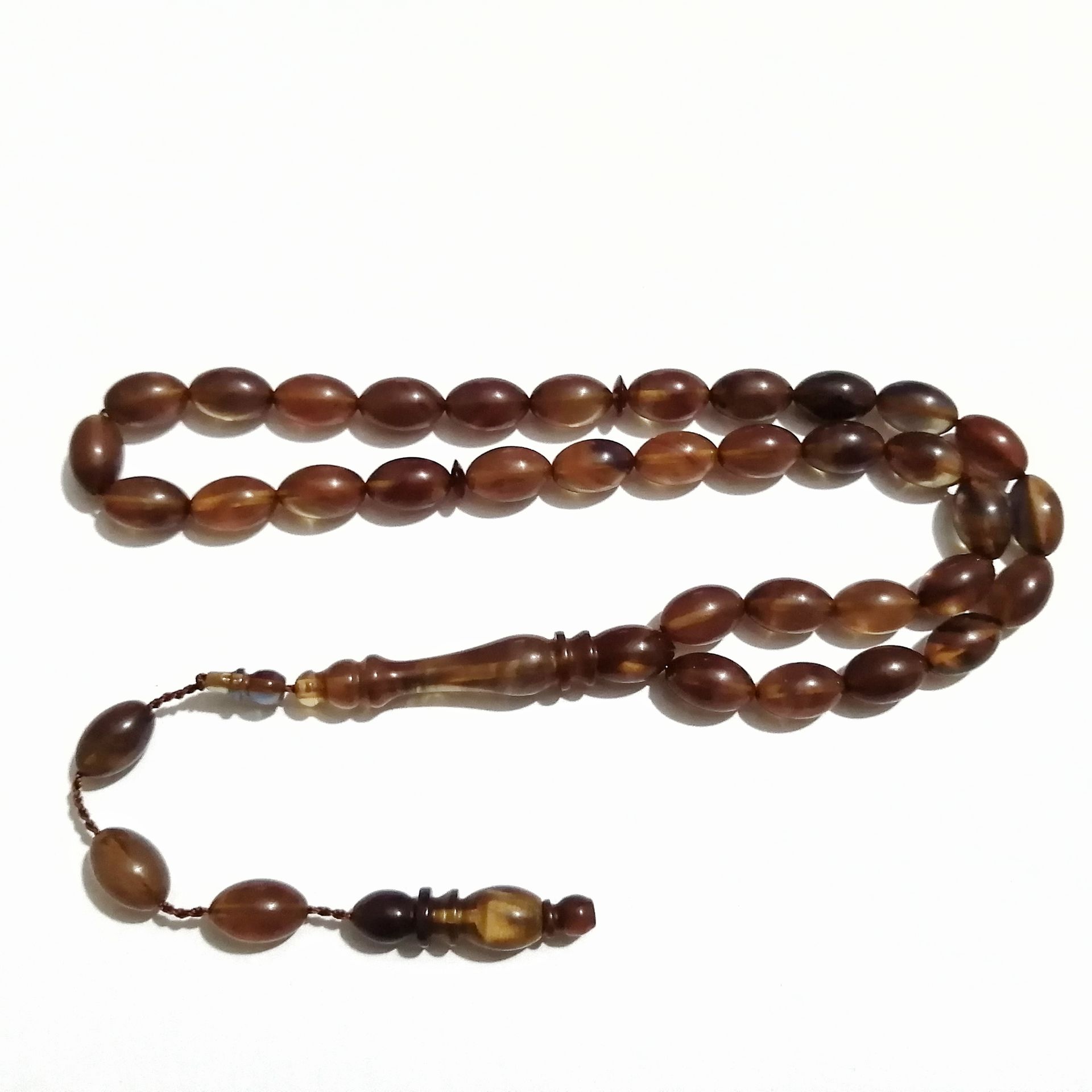 Sistem Püsküllü Beyzi Kesim Sıkma Kehribar Tesbih