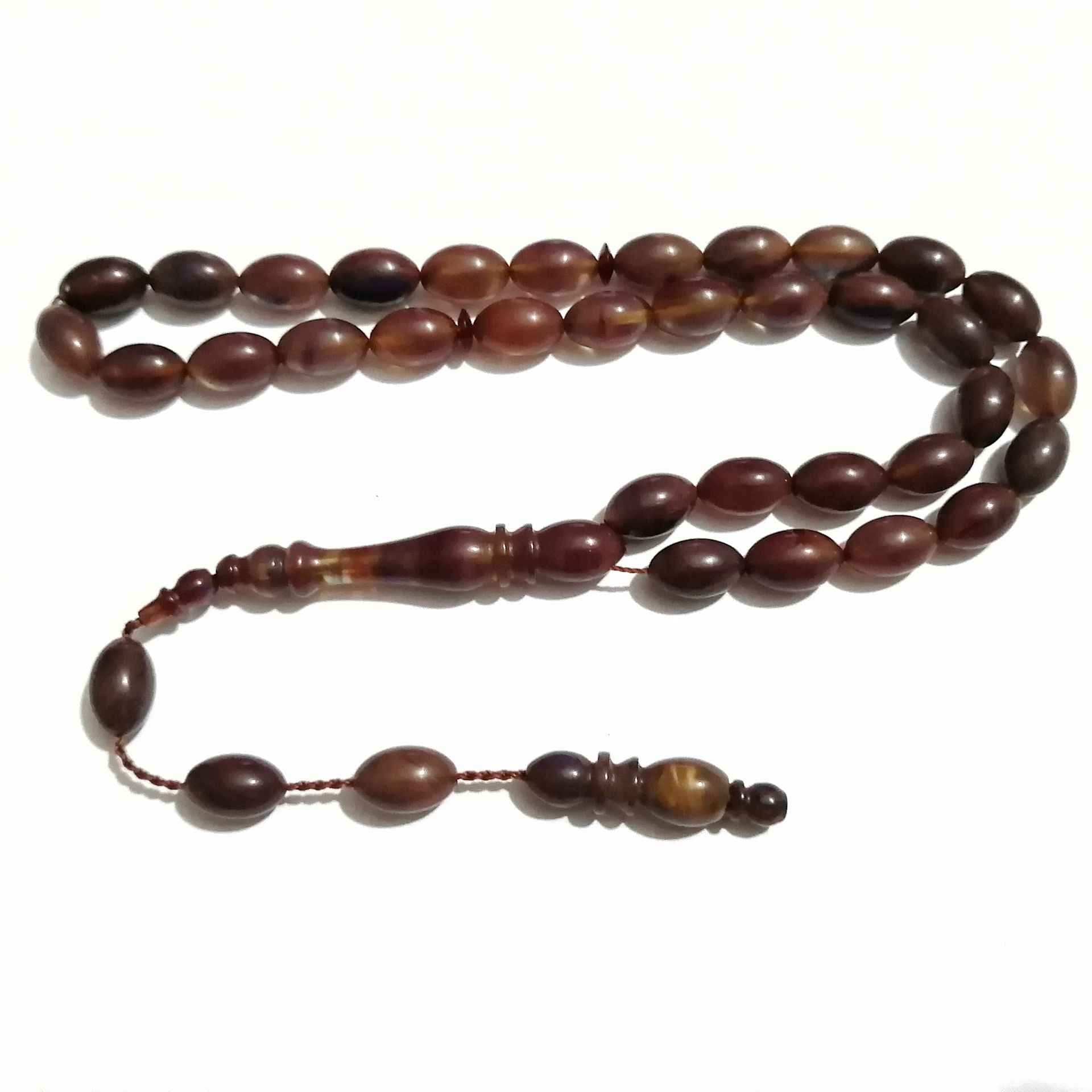 Sistem Püsküllü Beyzi Kesim Sıkma Kehribar Tesbih