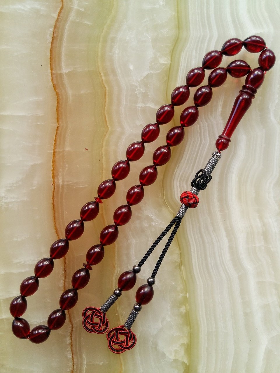 Kazaz Püsküllü Elde Yağ Gibi Çekimi Olan Birinci Kalite Malzemeden Yapılmış Beyzi Kesim Ateş Kehribar Tesbih