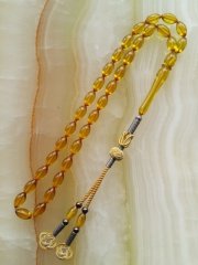 Kazaz Püsküllü Elde Yağ Gibi Çekimi Olan Birinci Sınıf Malzemeden Yapılmış Ateş Kehribar Tesbihimiz Tesbih Severlerin Beğenisine Sunulmuştur