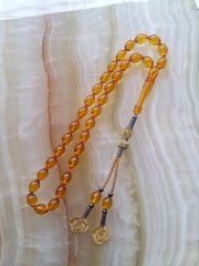 Kazaz Püsküllü Elde Yağ Gibi Çekimi Olan Birinci Kalite Malzemeden Yapılmış Ateş Kehribar Tesbih