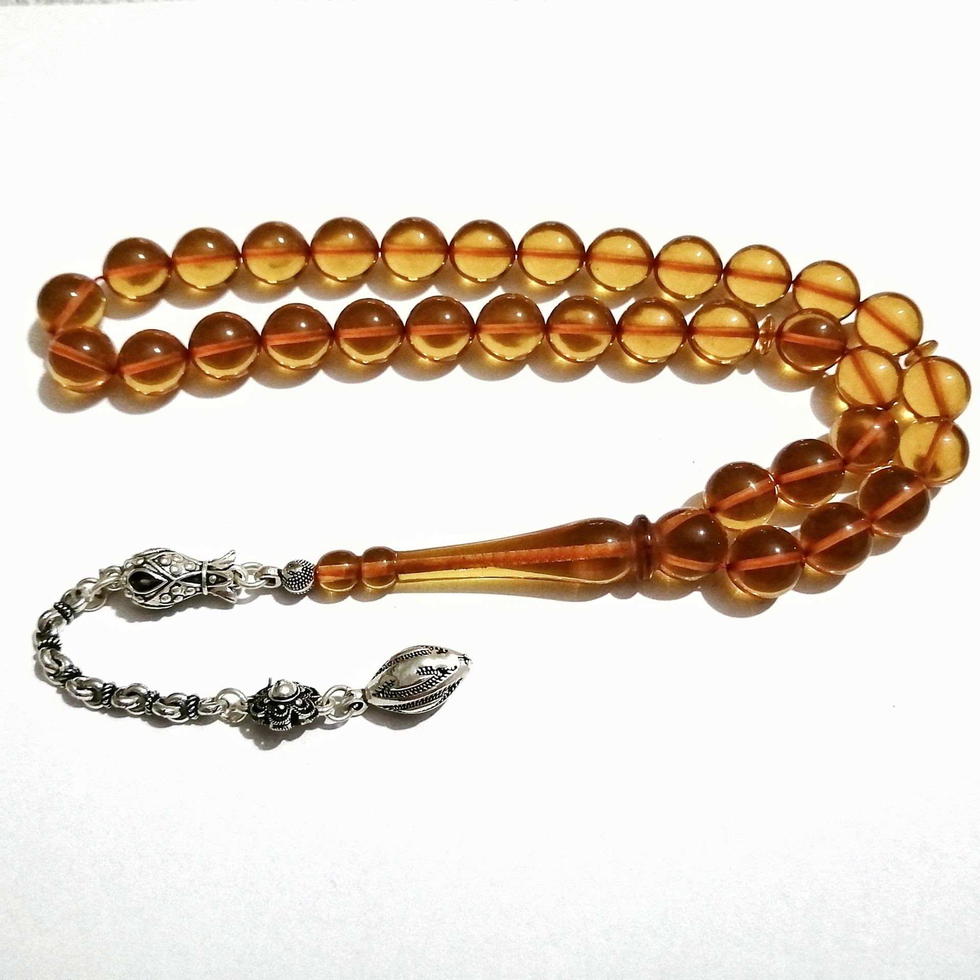 Gümüş Kaplama Püsküllü Uçlu Küre Kesim Ateş Kehribar Tesbih