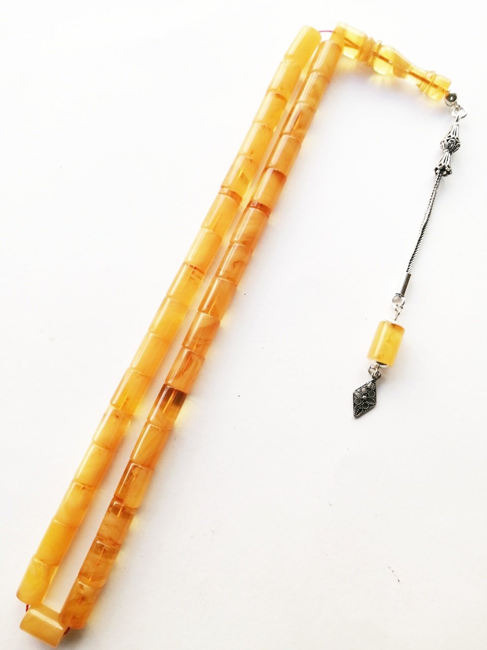 925 Ayar Gümüş Püsküllü Kesme Model Hareli Sıkma Kehribar Tesbih