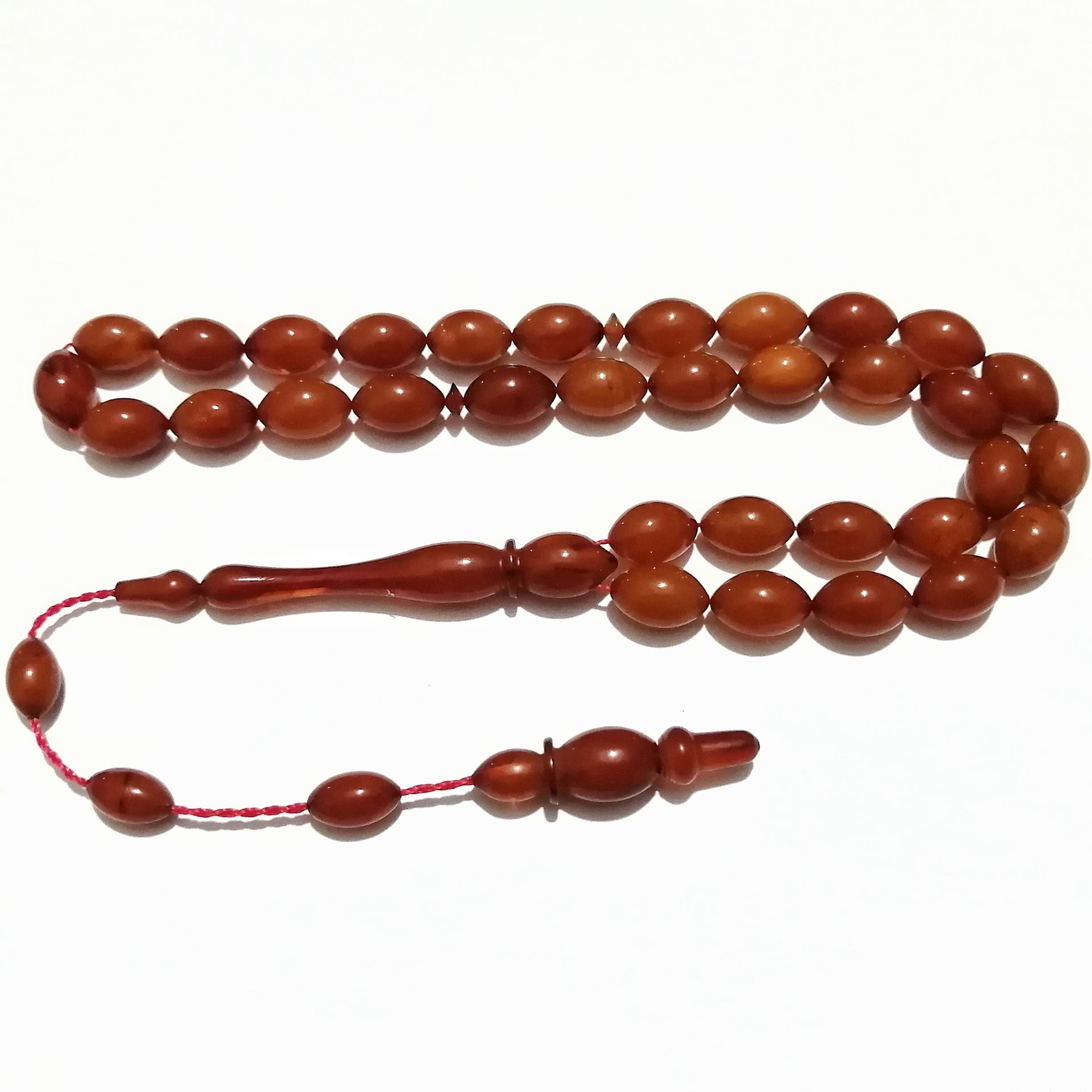 Sistem Püsküllü Beyzi Kesim Sıkma Kehribar Tesbih