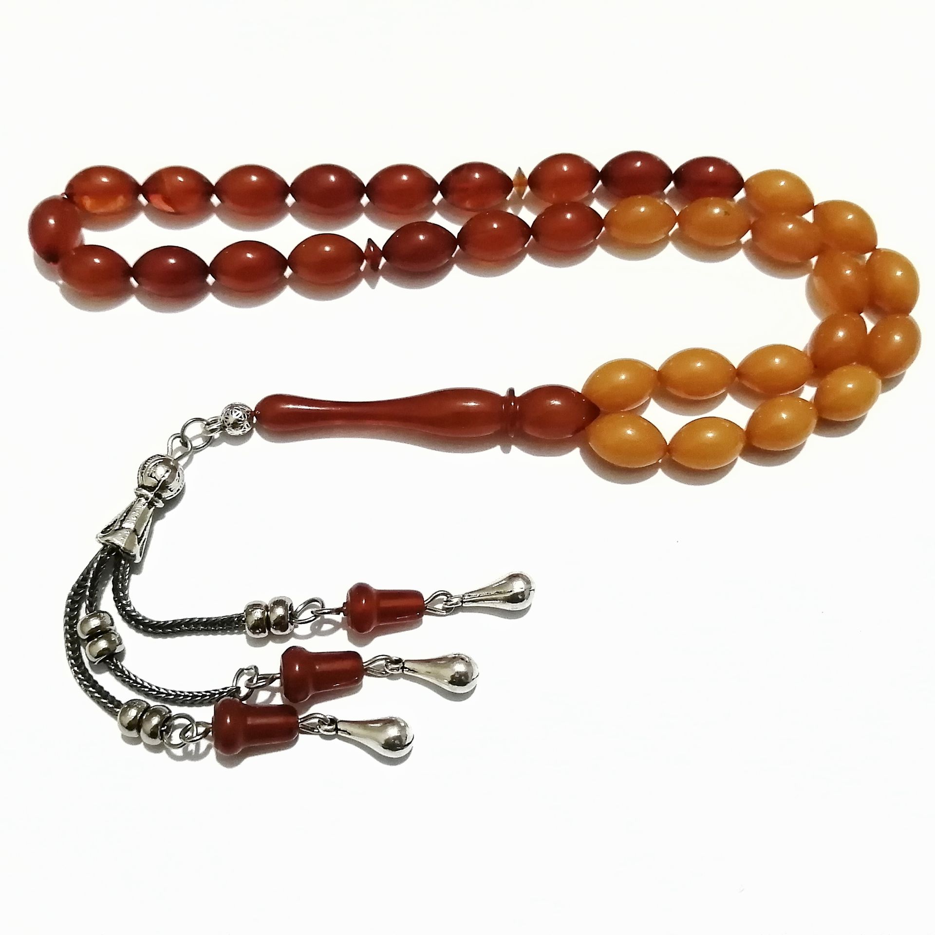 Alpaka Püsküllü Beyzi Kesim Sıkma Kehribar Tesbih