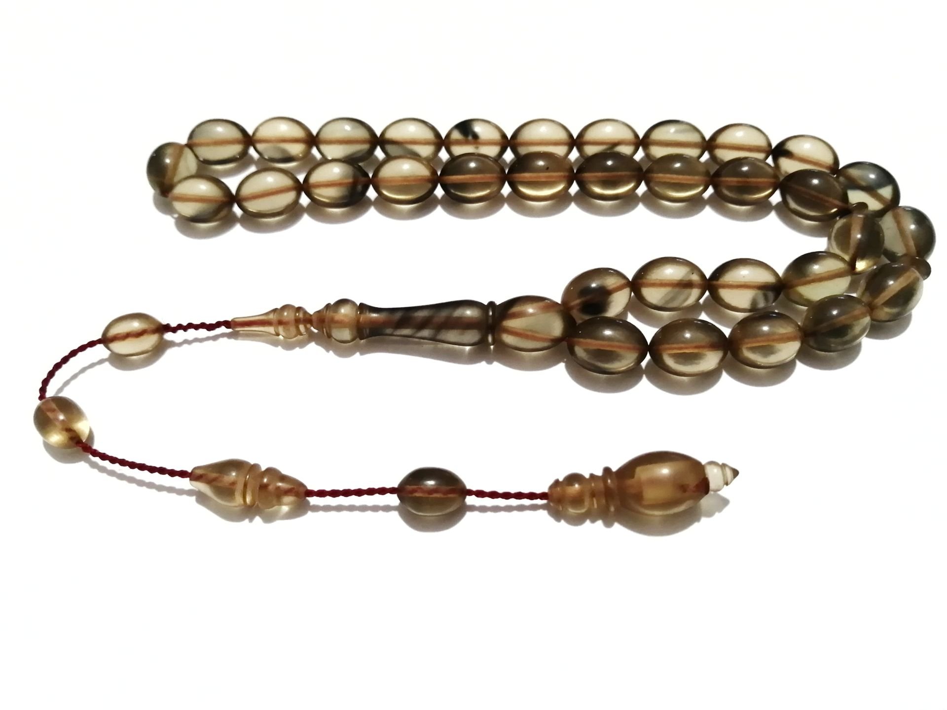 Sistem Püsküllü Beyzi Kesim Sıkma Kehribar Tesbih