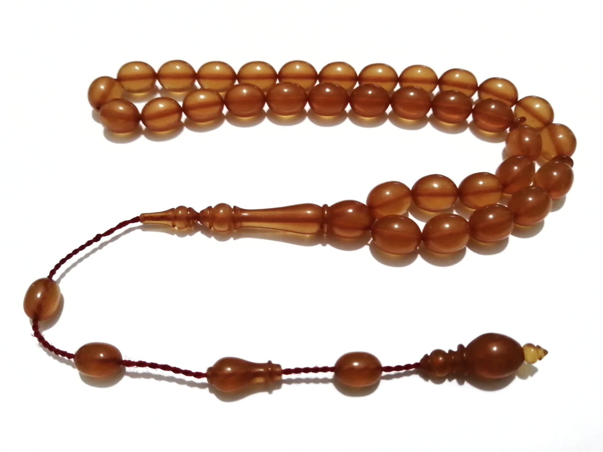 Sistem Püsküllü Beyzi Kesim Sıkma Kehribar Tesbih