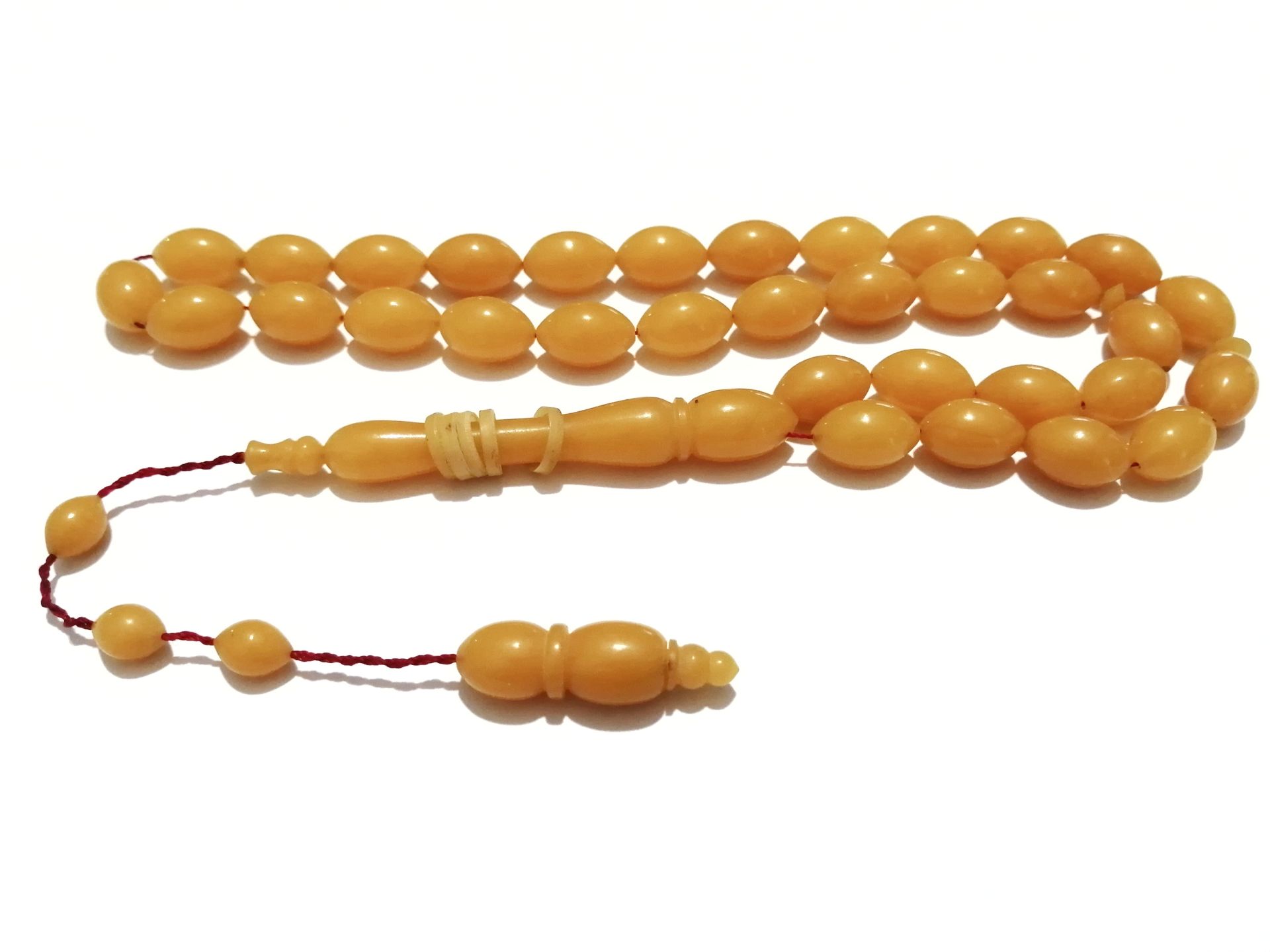 Sistem Püsküllü Beyzi Kesim Sarı Sıkma Kehribar Tesbih