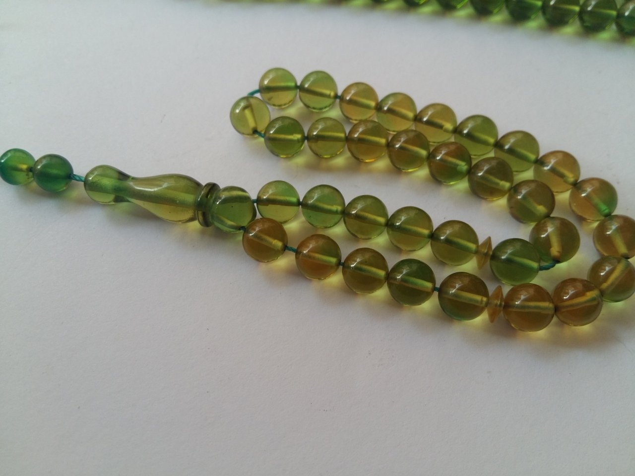 Şeffaf Yeşil Yansimalı Özel İşçilikli Ateş Kehribar Tesbih