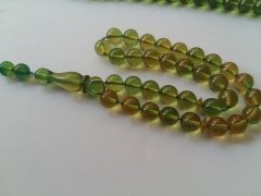 Şeffaf Yeşil Yansimalı Özel İşçilikli Ateş Kehribar Tesbih