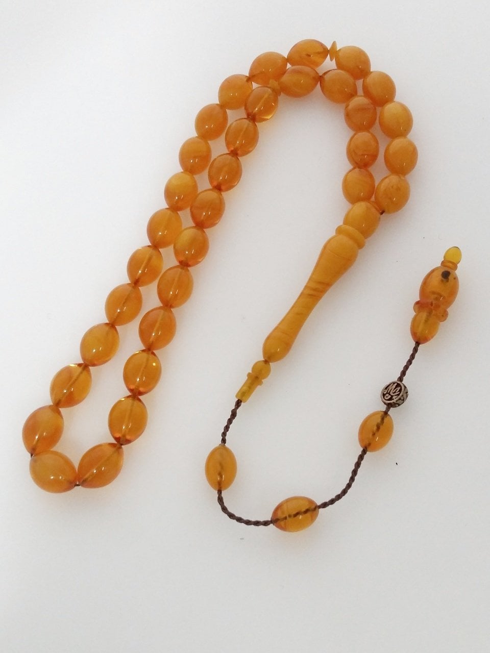 Sistemli Özel İşçilikli Usta imzalı Hareli Sıkma Kehribar Tesbih