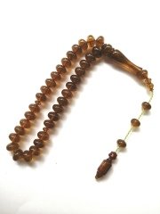 Sistem Püsküllü Özel İşçilikli Basık Kesim Bilek Boy Sıkma Kehribar Tesbih