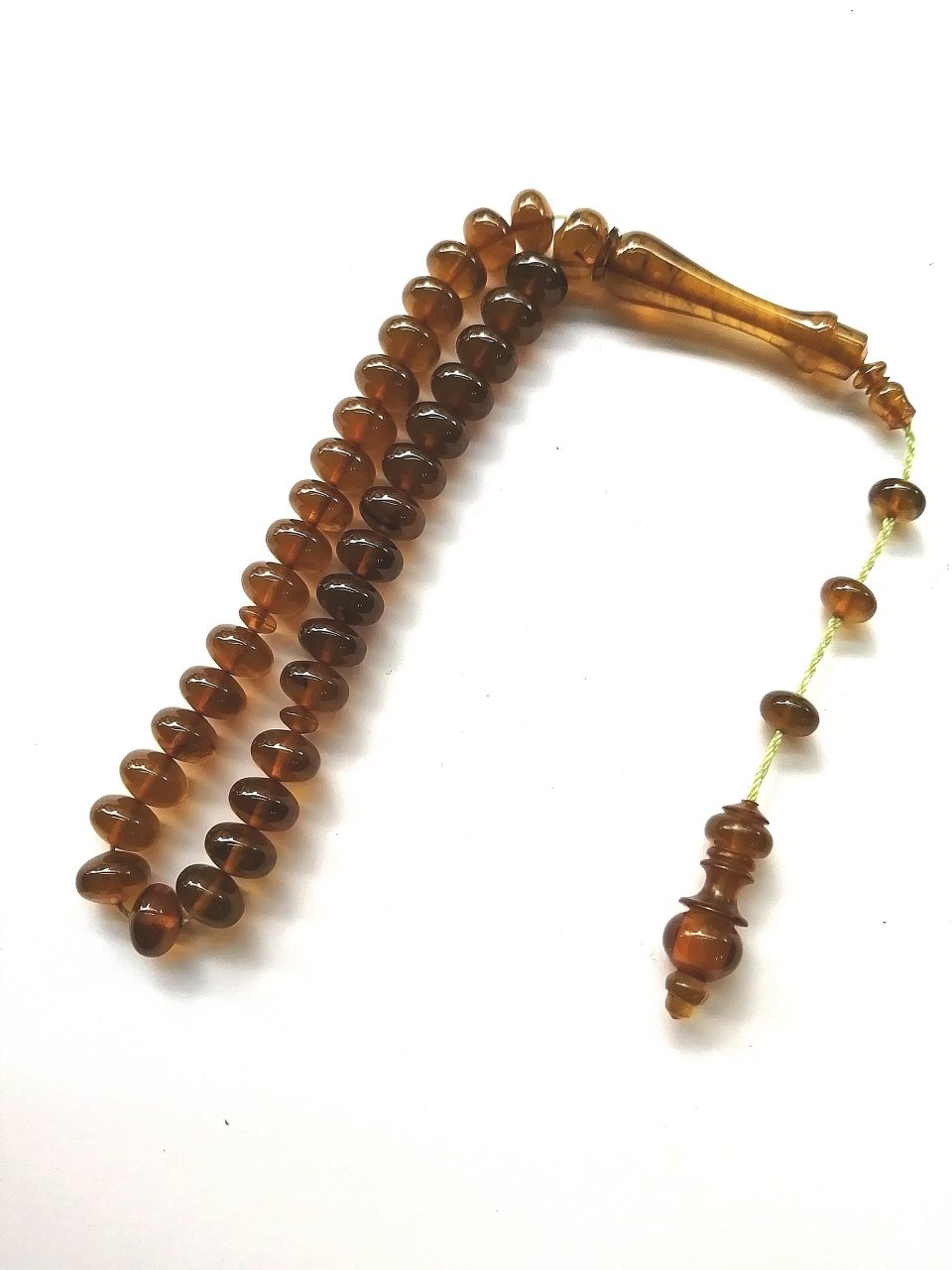 Sistem Püsküllü Özel İşçilikli Basık Kesim Bilek Boy Sıkma Kehribar Tesbih