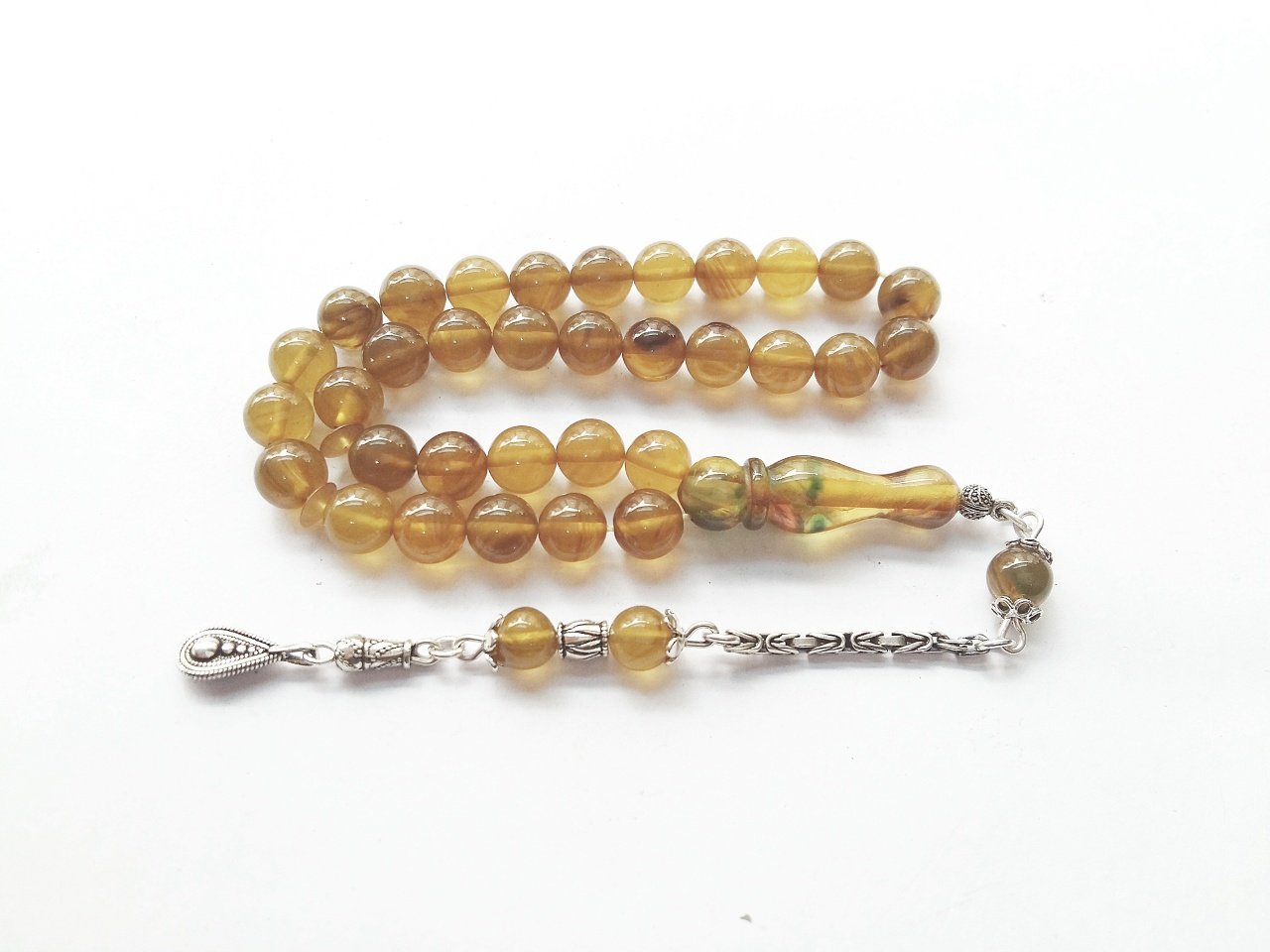 925 Ayar Gümüş Püsküllü Hareli Küre Kesim Sıkma Kehribar Tesbih