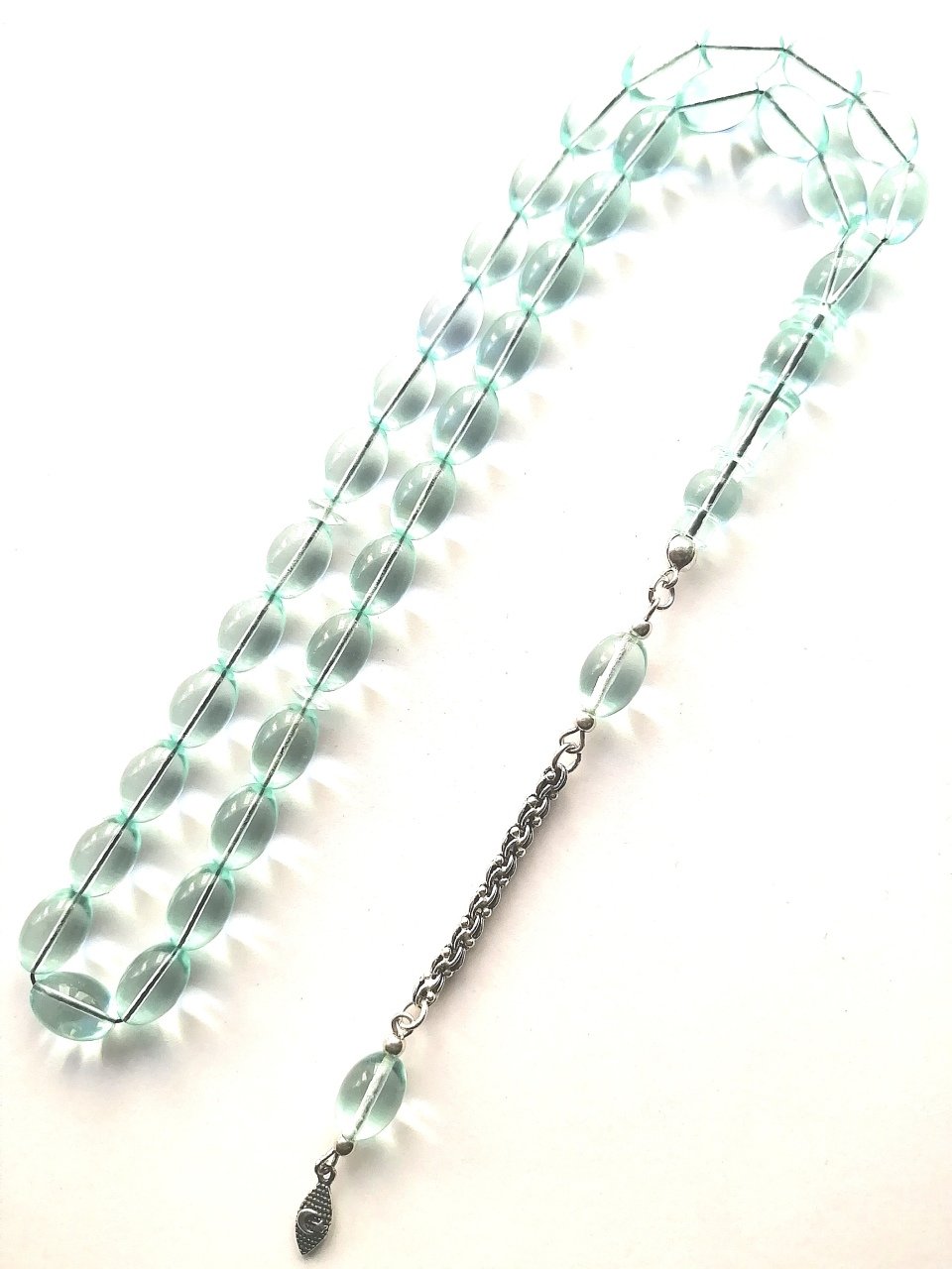 925 Ayar Gümüş Püsküllü İmamesi Özel İşçilikli Beyzi Kesim Şeffaf Delim Uçak Camı Tesbihimiz Toptan Fiyatına Türkiyenin Online Toptan Tesbih Satış Sitesi toptantesbih.com da Beğeninize Sunulmuştur