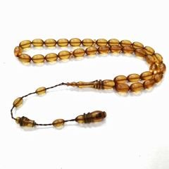 Sistem Püsküllü Sikke İmzalı Badem Kesim Ateş Kehribar Tesbih