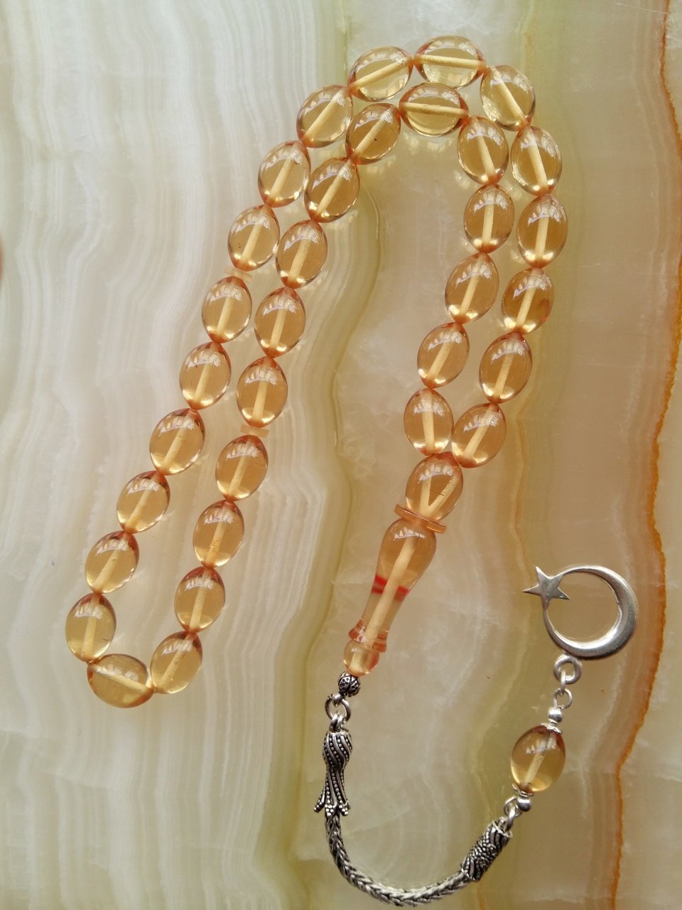 925 Ayar Gümüş Püsküllü Özel İşçilikli Atölye Yapımı Tombul Beyzi Kesim Ateş Kehribar Tesbih