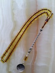 925 Ayar Gümüş Püsküllü Özel İşçilikli Atölye Yapımı Kesme Model Ateş Kehribar Tesbih